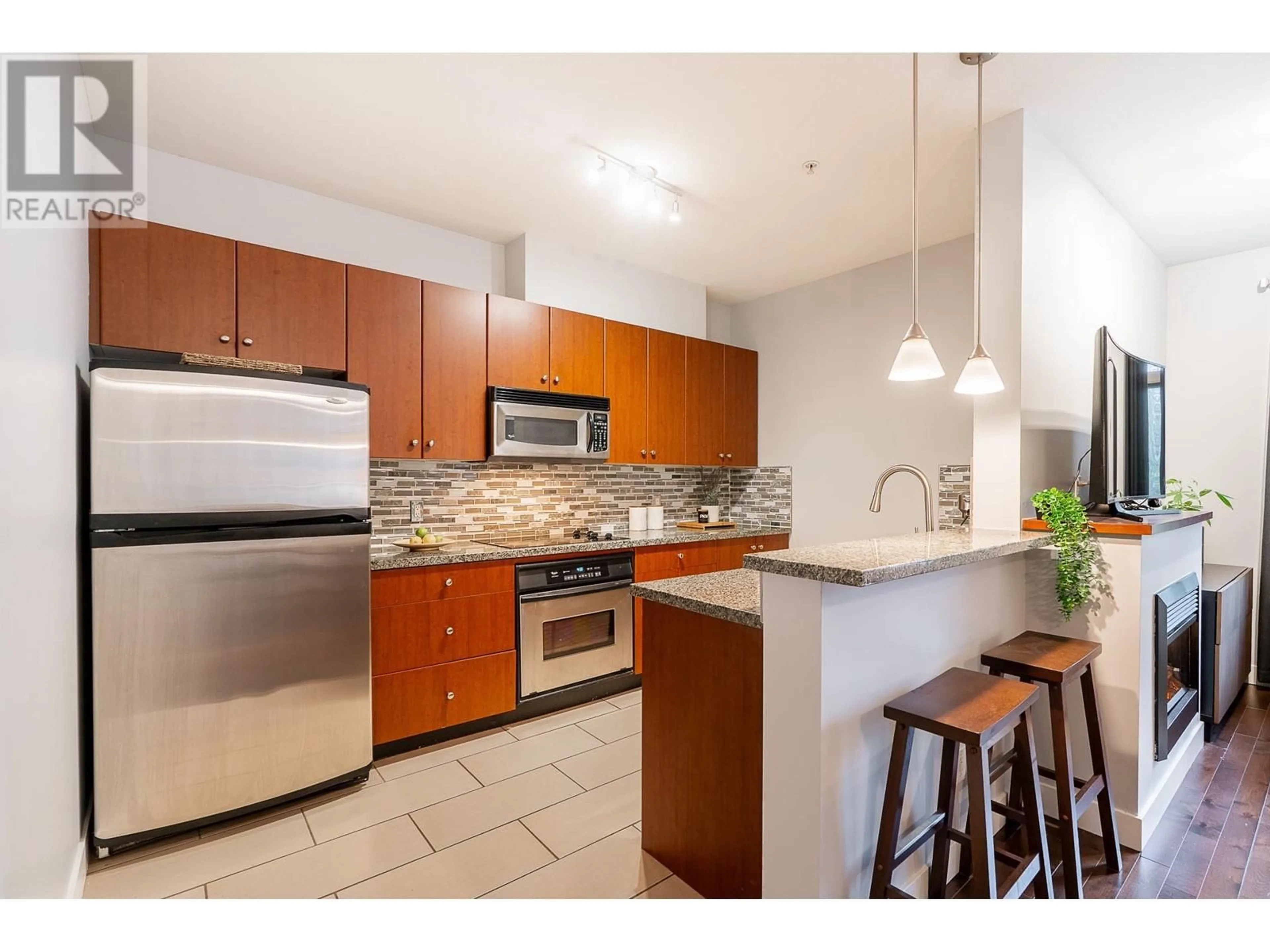 Standard kitchen, ceramic/tile floor for 305 - 200 CAPILANO ROAD, Port Moody British Columbia V3H5N1