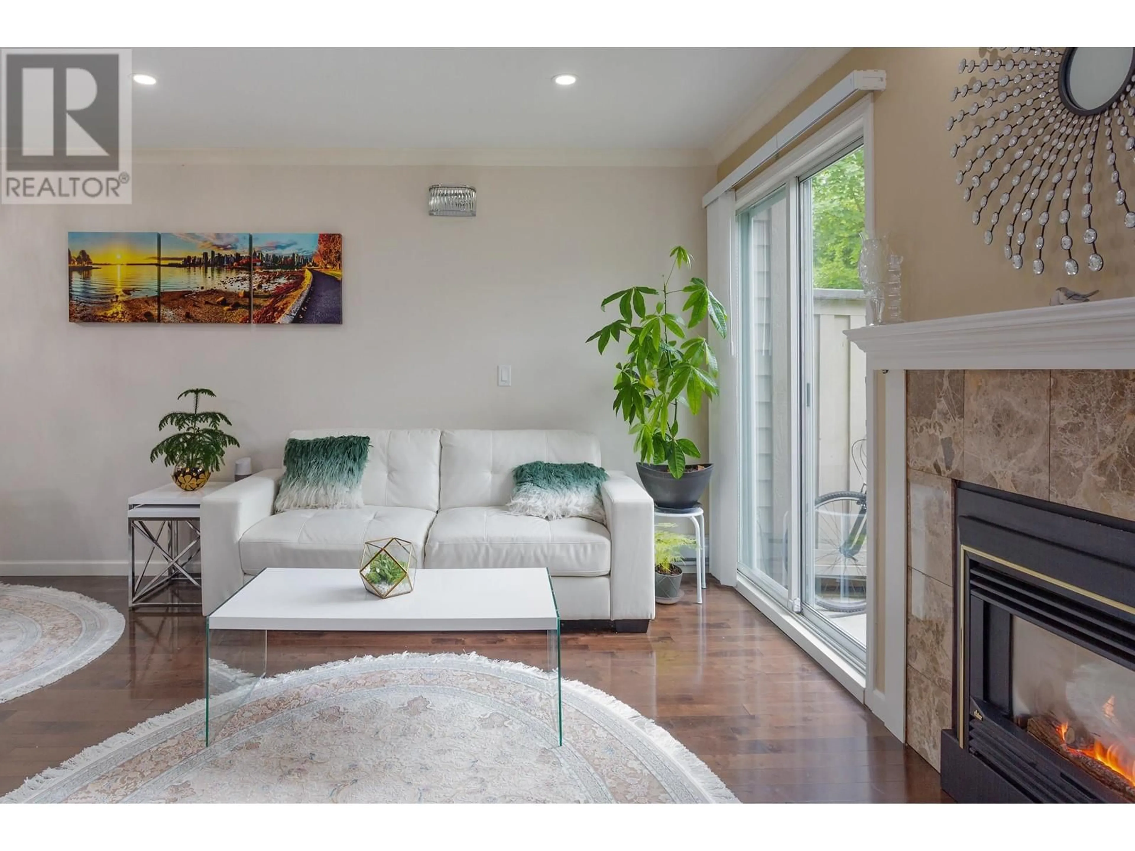 Living room with furniture, wood/laminate floor for 810 ROCHE POINT DRIVE, North Vancouver British Columbia V7H2T8