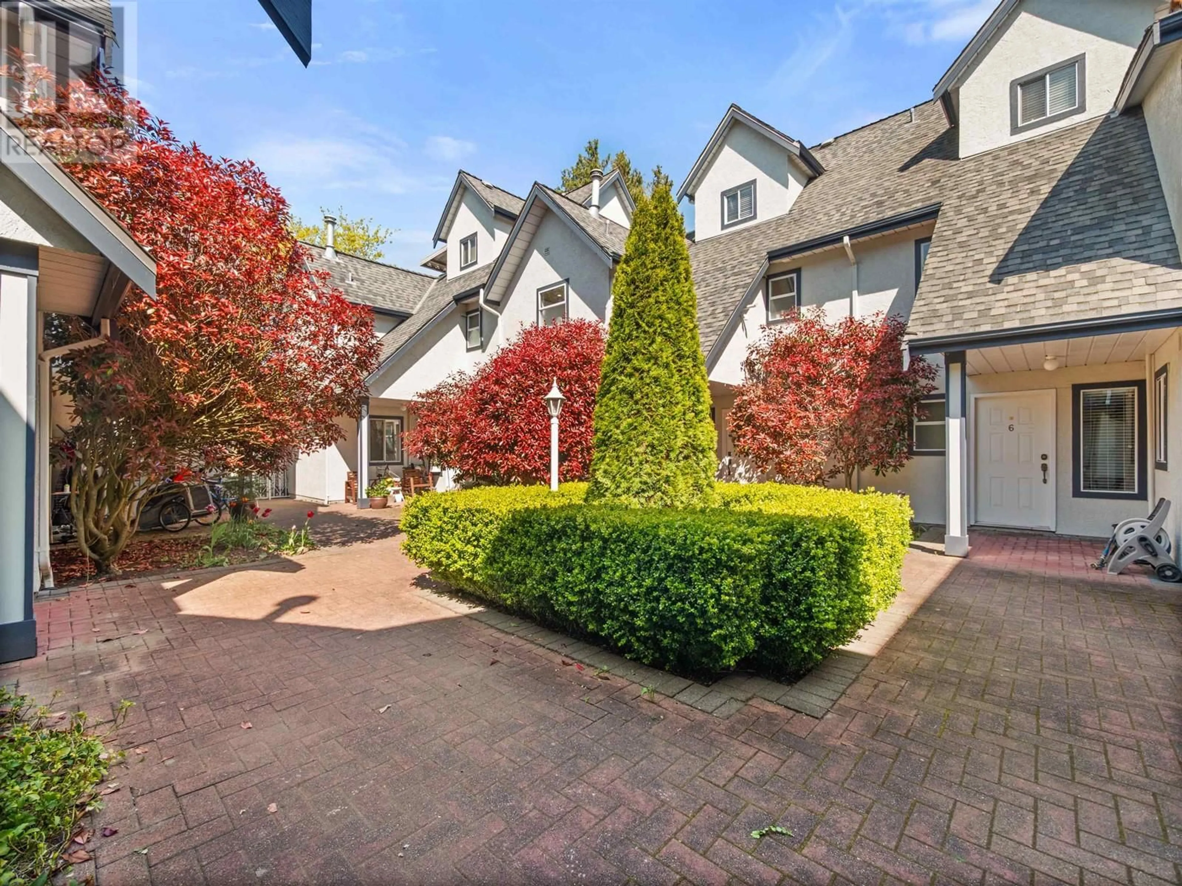 A pic from outside/outdoor area/front of a property/back of a property/a pic from drone, street for 3 - 4890 48 AVENUE, Delta British Columbia V4K1V3
