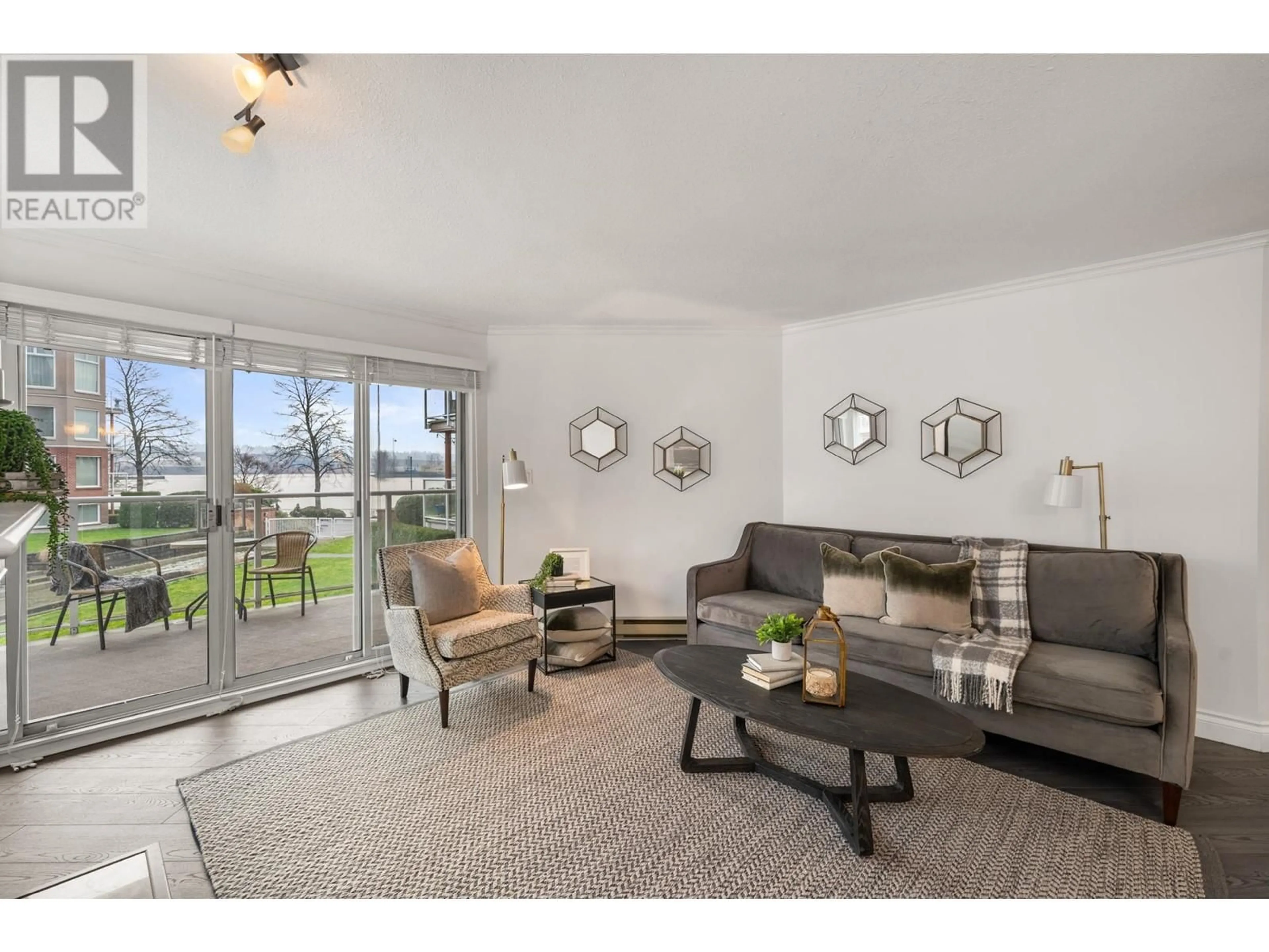 Living room with furniture, unknown for 209 - 1230 QUAYSIDE DRIVE, New Westminster British Columbia V3M6H1