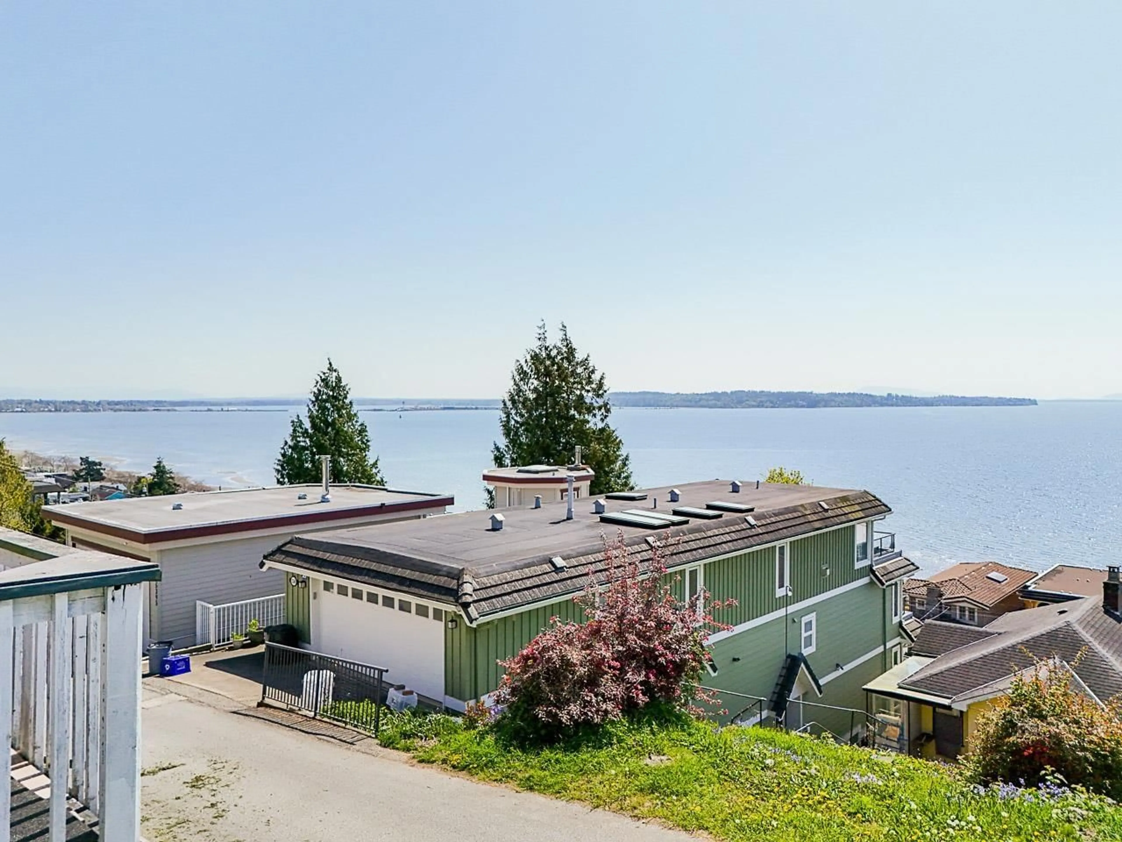 A pic from outside/outdoor area/front of a property/back of a property/a pic from drone, water/lake/river/ocean view for 15412 COLUMBIA, White Rock British Columbia V4B1J9