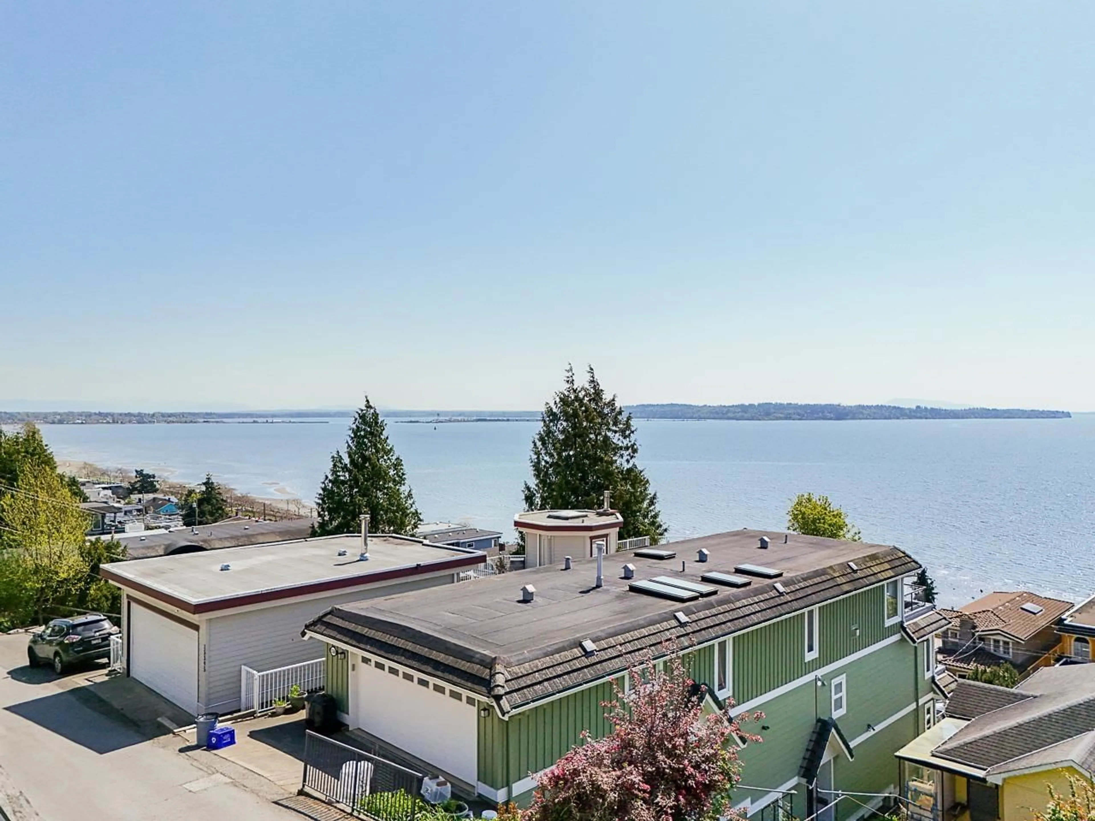 A pic from outside/outdoor area/front of a property/back of a property/a pic from drone, water/lake/river/ocean view for 15412 COLUMBIA, White Rock British Columbia V4B1J9