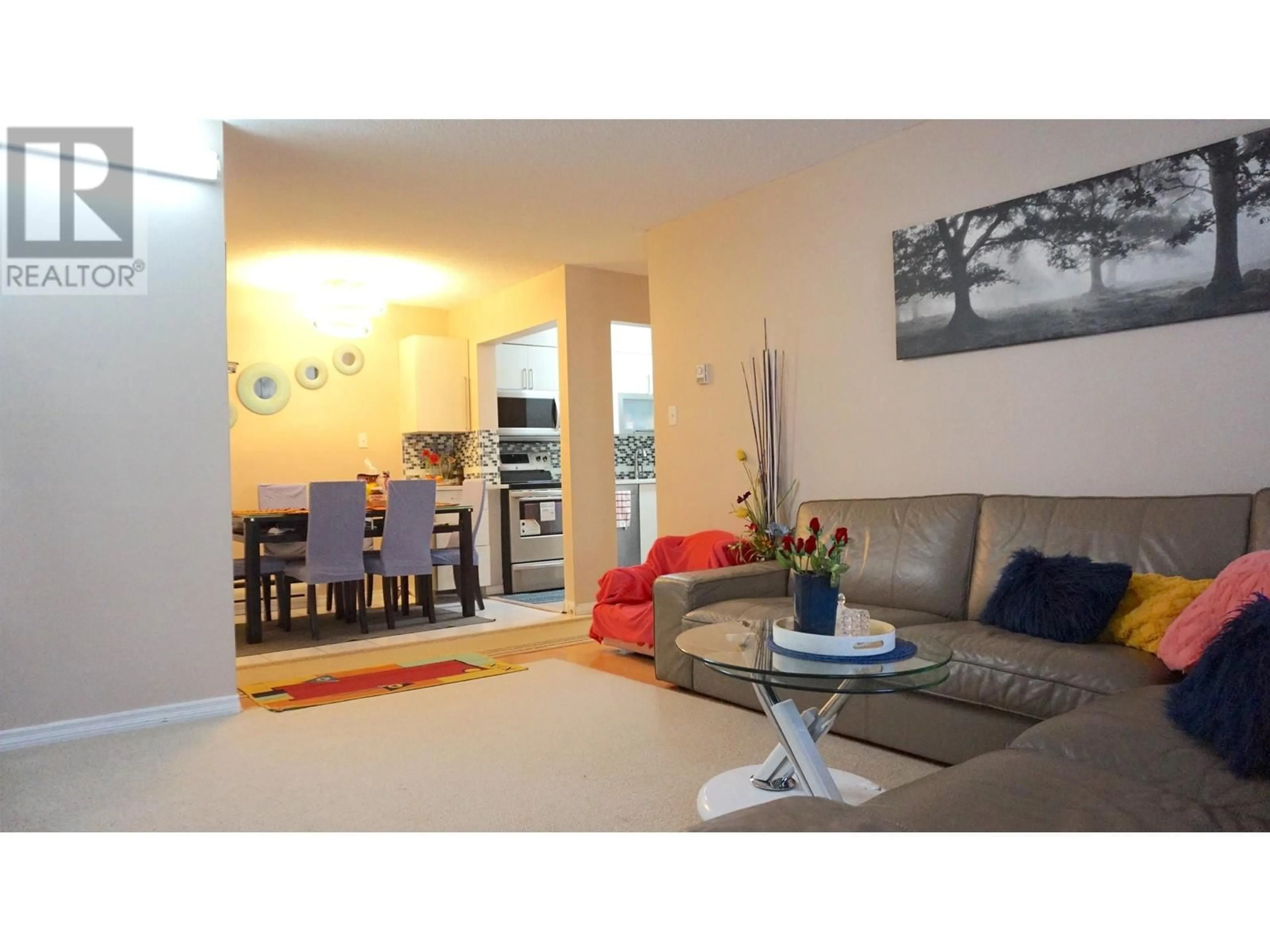 Living room with furniture, wood/laminate floor for 12 - 7567 HUMPHRIES COURT, Burnaby British Columbia V3N4K9