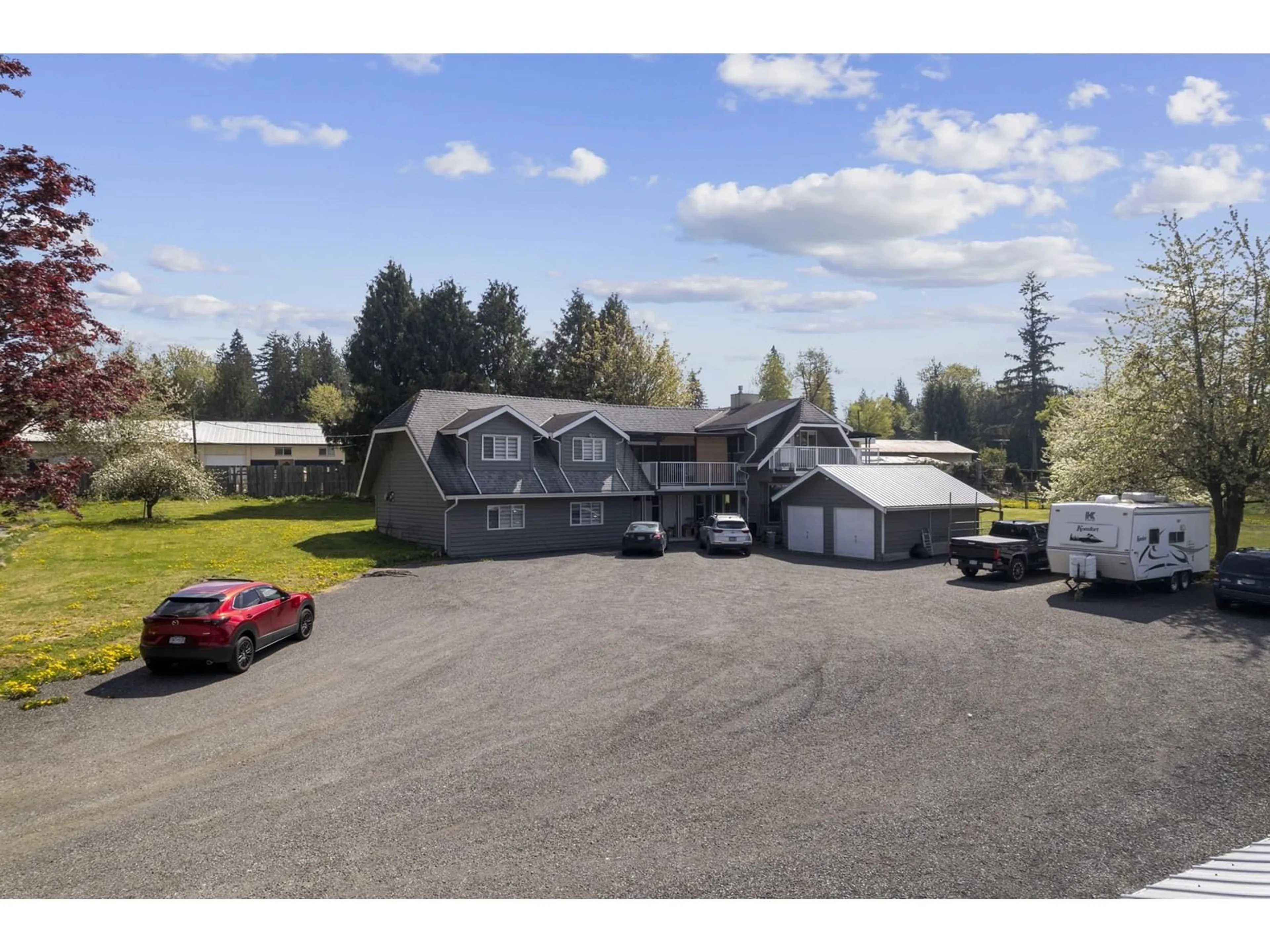 A pic from outside/outdoor area/front of a property/back of a property/a pic from drone, mountain view for 25412 58, Langley British Columbia V4W1G7