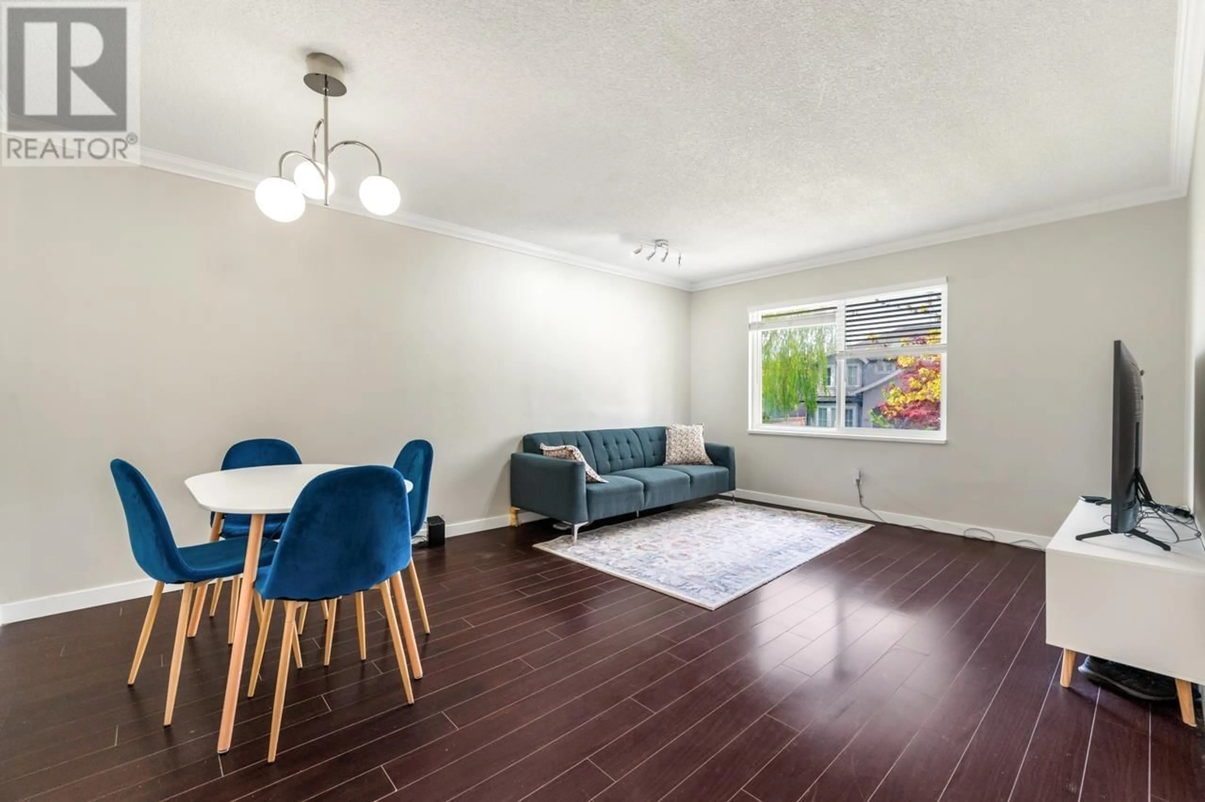 Living room with furniture, wood/laminate floor for 10860 BONAVISTA GATE, Richmond British Columbia V7E4K3
