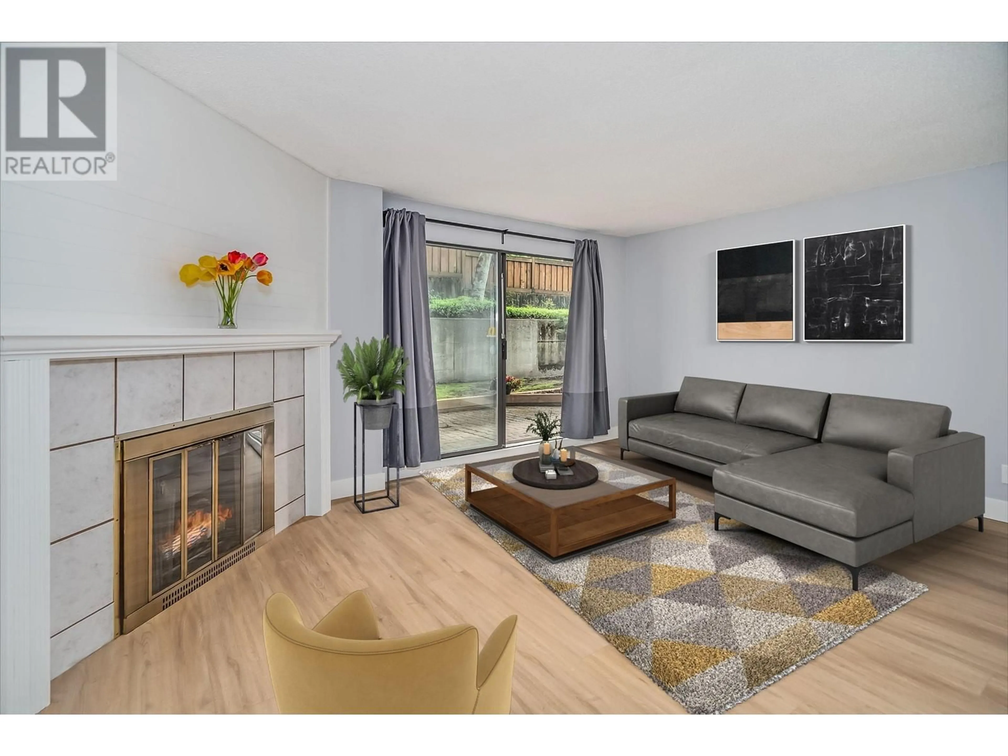 Living room with furniture, wood/laminate floor for 108 - 315 TENTH STREET, New Westminster British Columbia V3M3Y2
