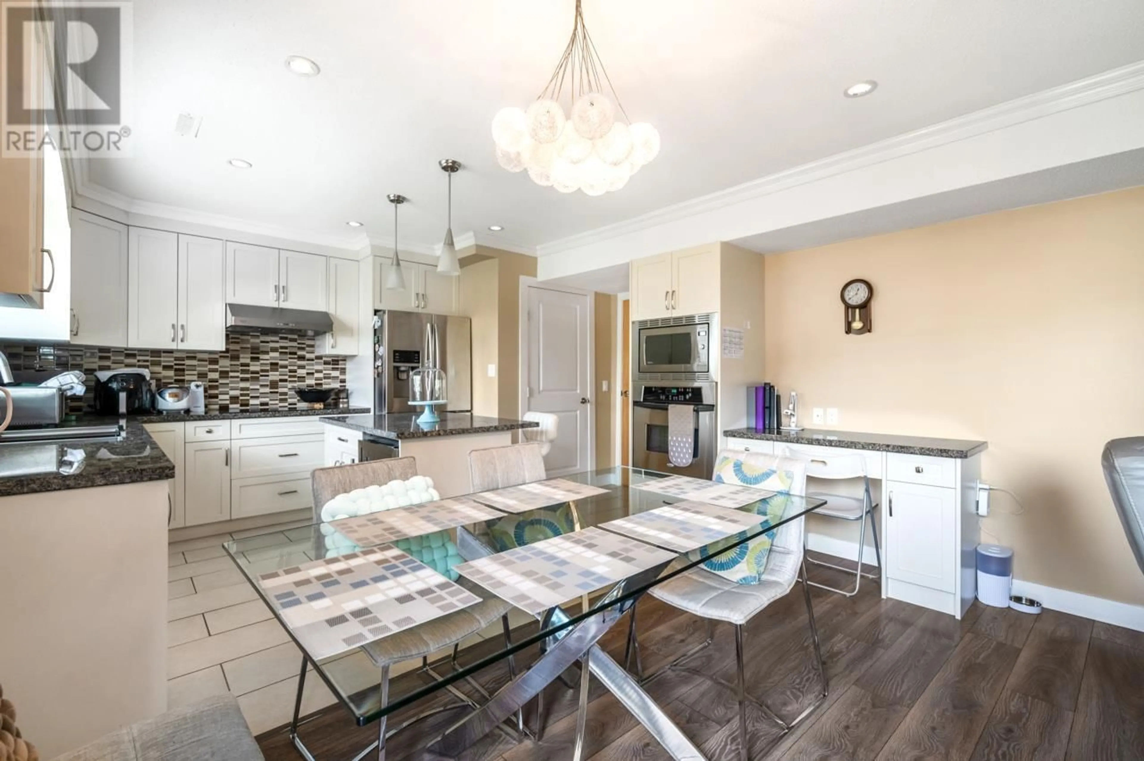 Open concept kitchen, ceramic/tile floor for 10840 BONAVISTA GATE, Richmond British Columbia V7E4K3
