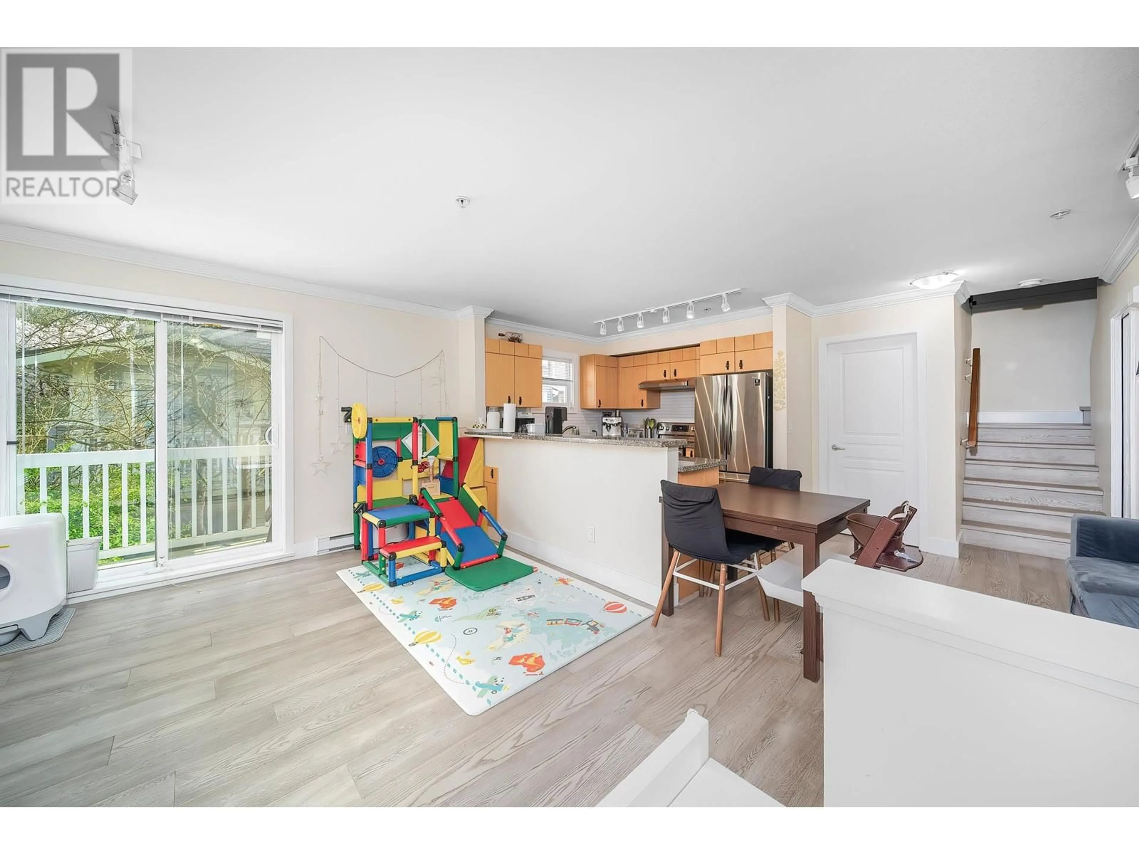 Open concept kitchen, wood/laminate floor for 34 - 7428 SOUTHWYNDE AVENUE, Burnaby British Columbia V3N0A1