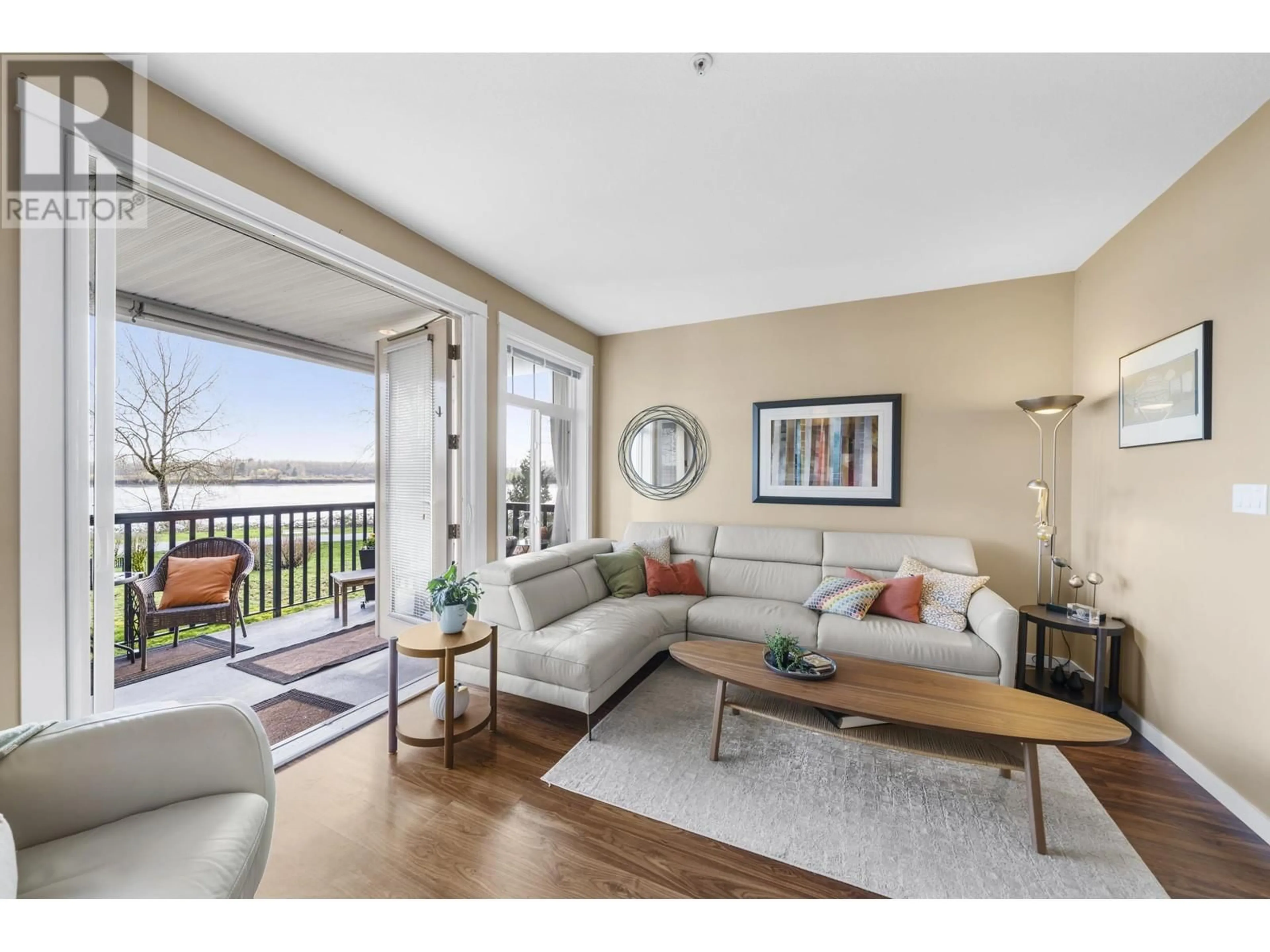 Living room with furniture, wood/laminate floor for 30 - 19490 FRASER WAY, Pitt Meadows British Columbia V3Y0B6