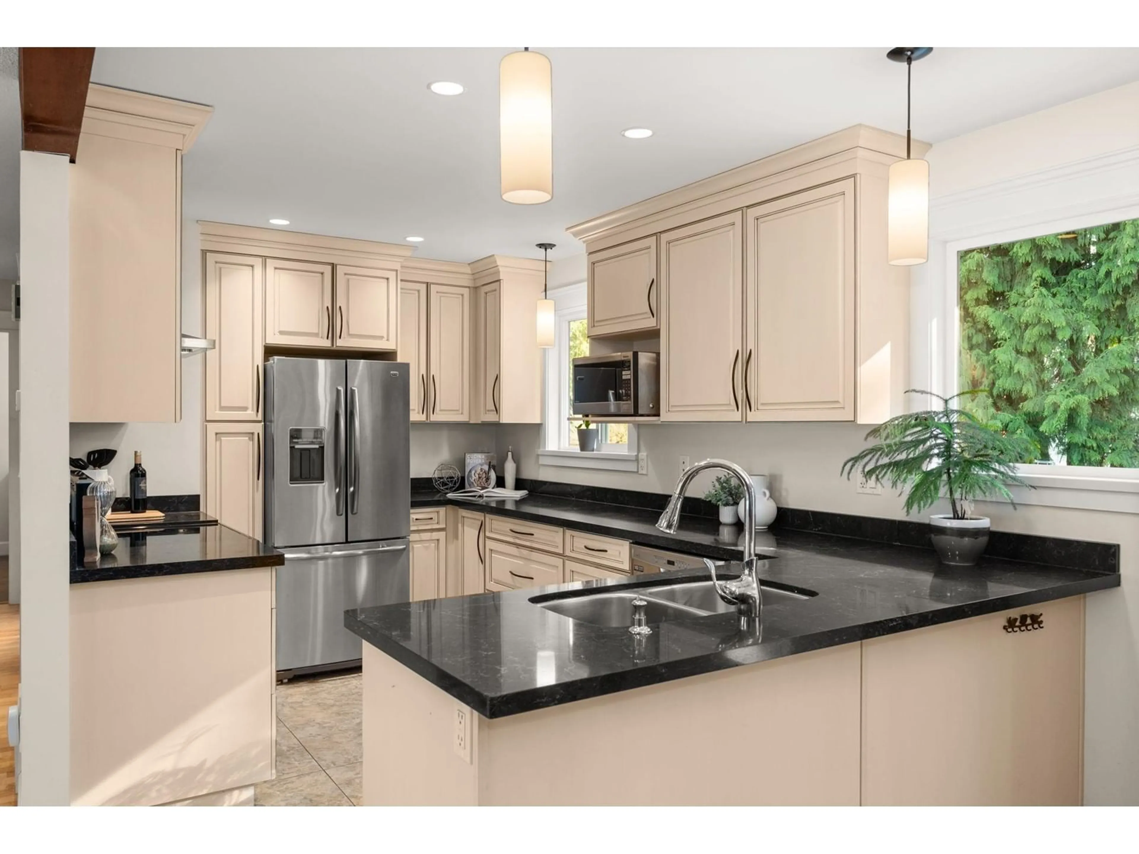 Open concept kitchen, ceramic/tile floor for 8755 DELWOOD, Delta British Columbia V4C4A1