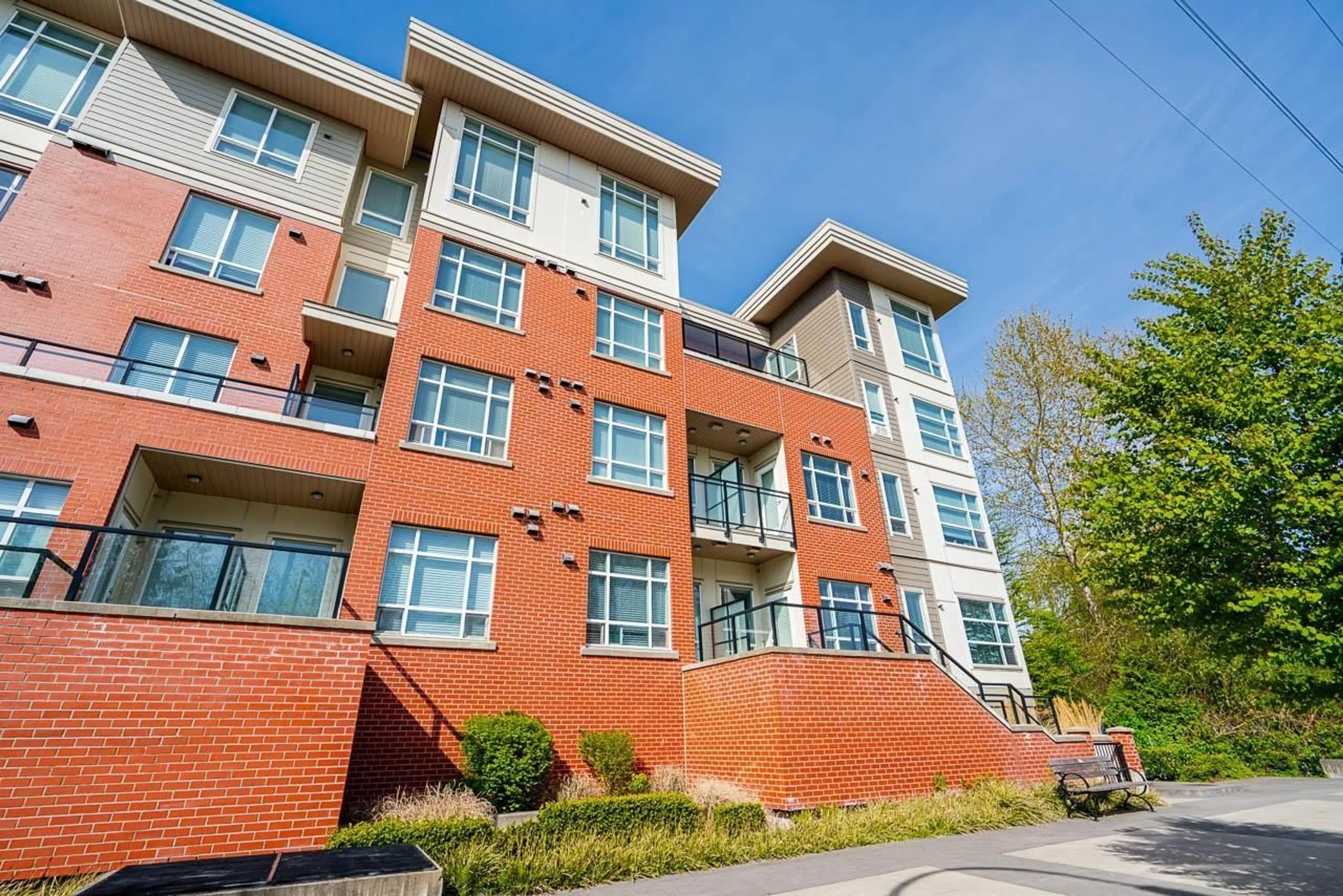 Home with brick exterior material, building for F104 - 20211 66, Langley British Columbia V2Y0L4