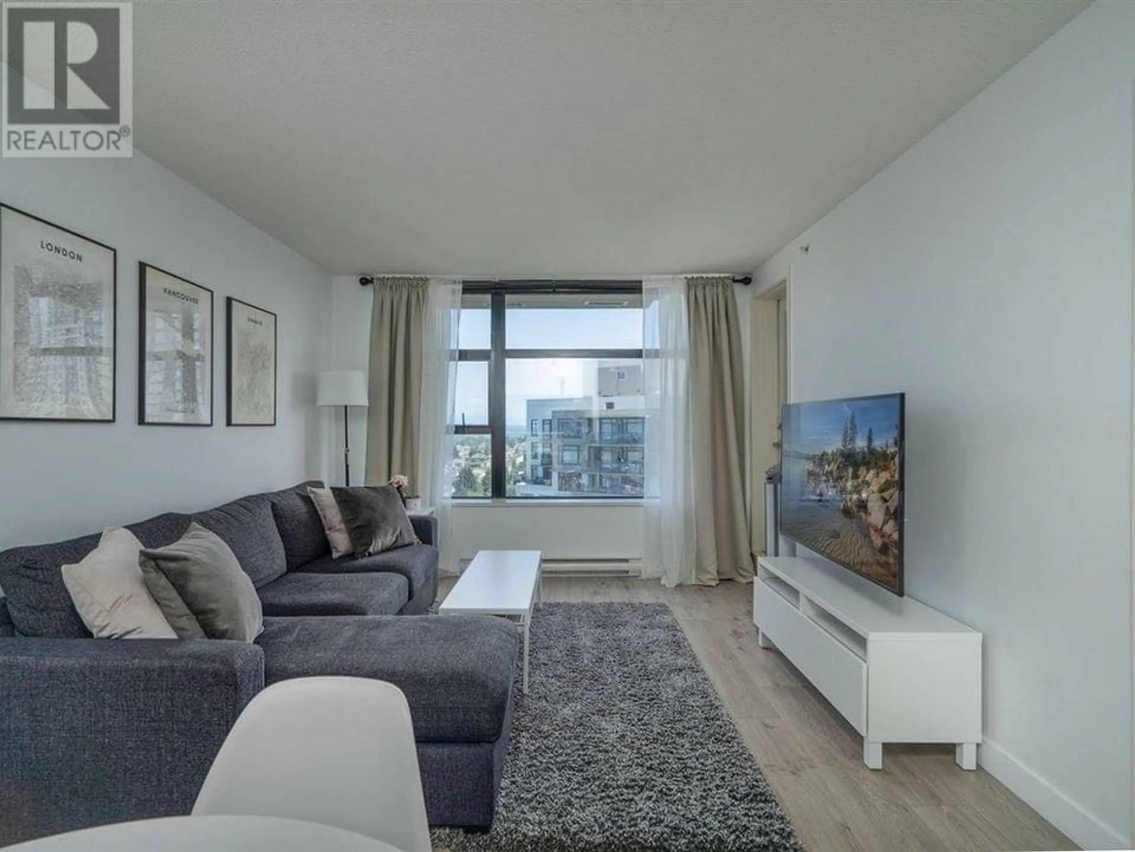 Living room with furniture, unknown for 2301 - 5380 OBEN STREET, Vancouver British Columbia V5R6H7