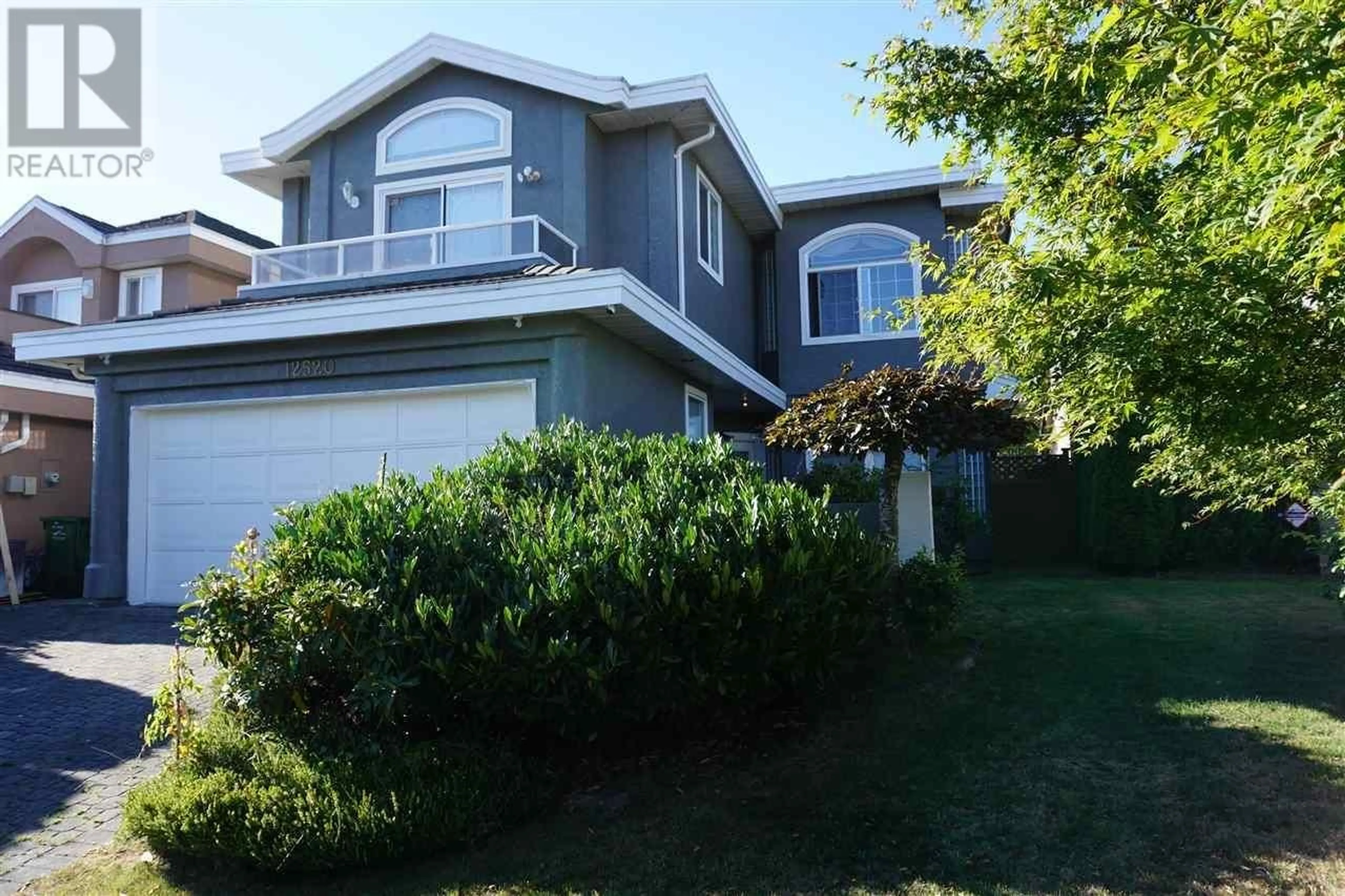 Home with vinyl exterior material, street for 12520 CAMERON DRIVE, Richmond British Columbia V6V2T6