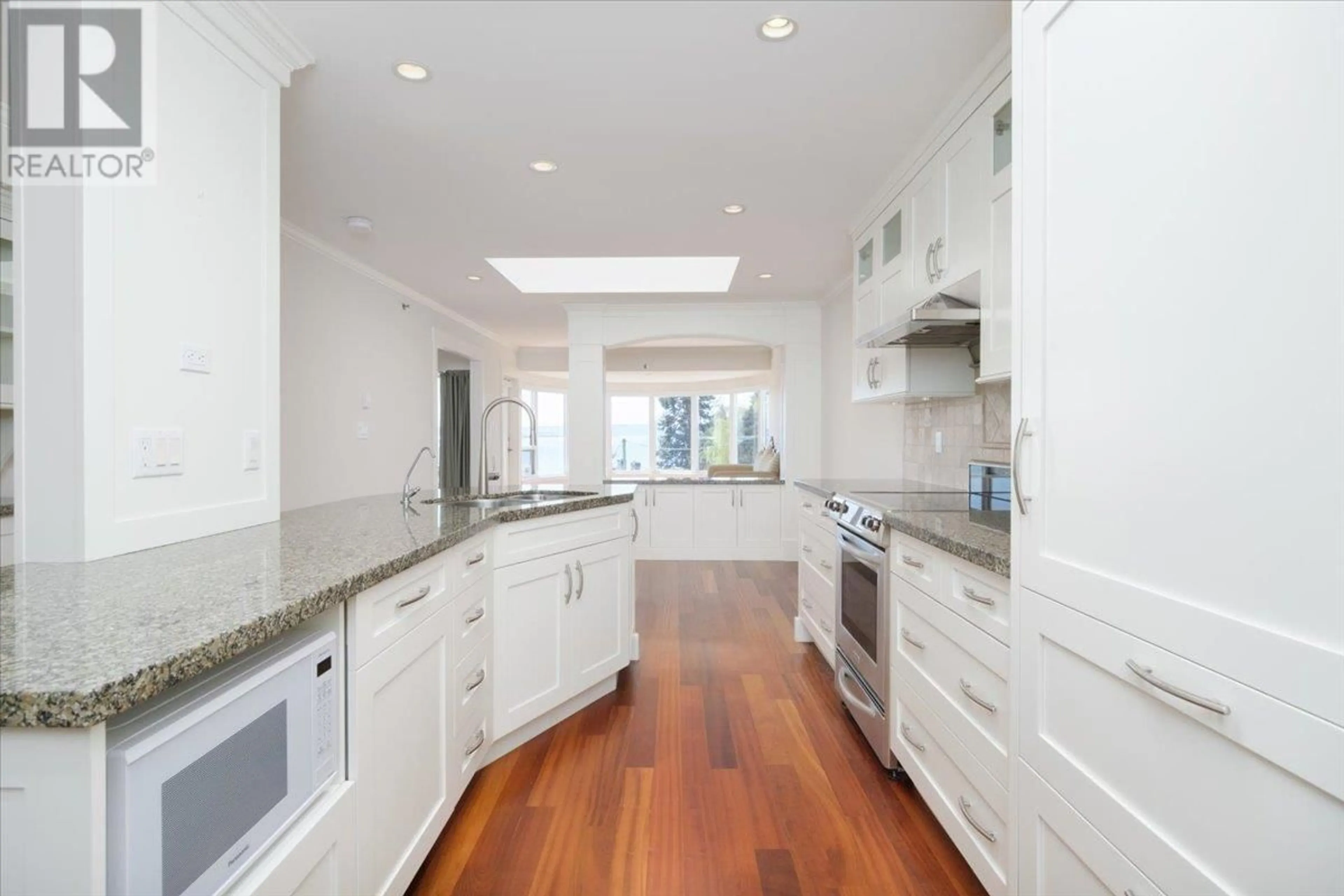 Contemporary kitchen, ceramic/tile floor for 302 - 2455 BELLEVUE AVENUE, West Vancouver British Columbia V7V1E1