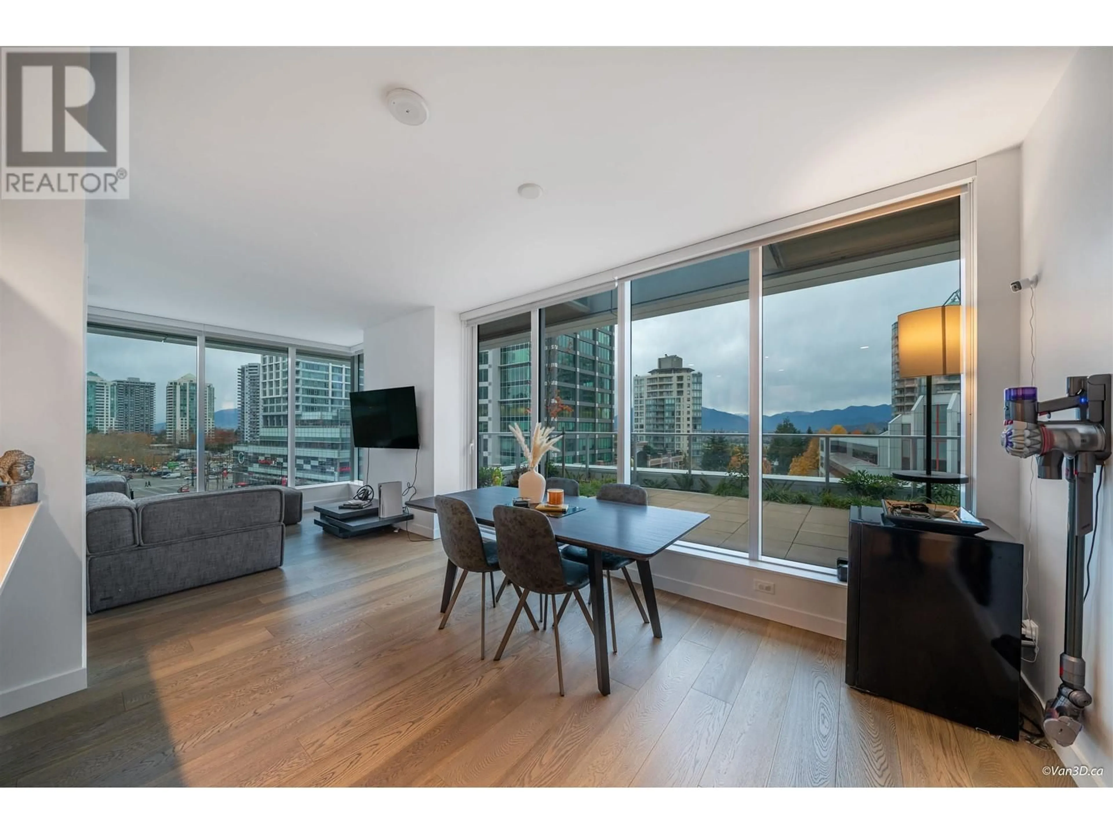 Living room with furniture, wood/laminate floor for 406 - 6000 MCKAY AVENUE, Burnaby British Columbia V5H0K2