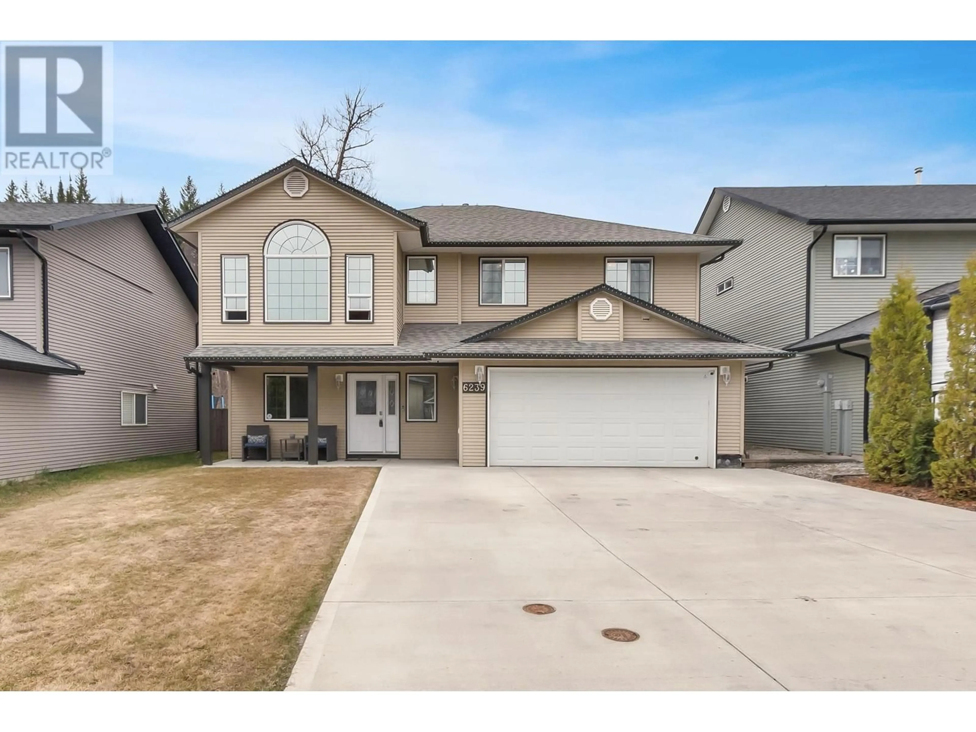 Home with vinyl exterior material, street for 6239 MONTEREY ROAD, Prince George British Columbia V2K5G7
