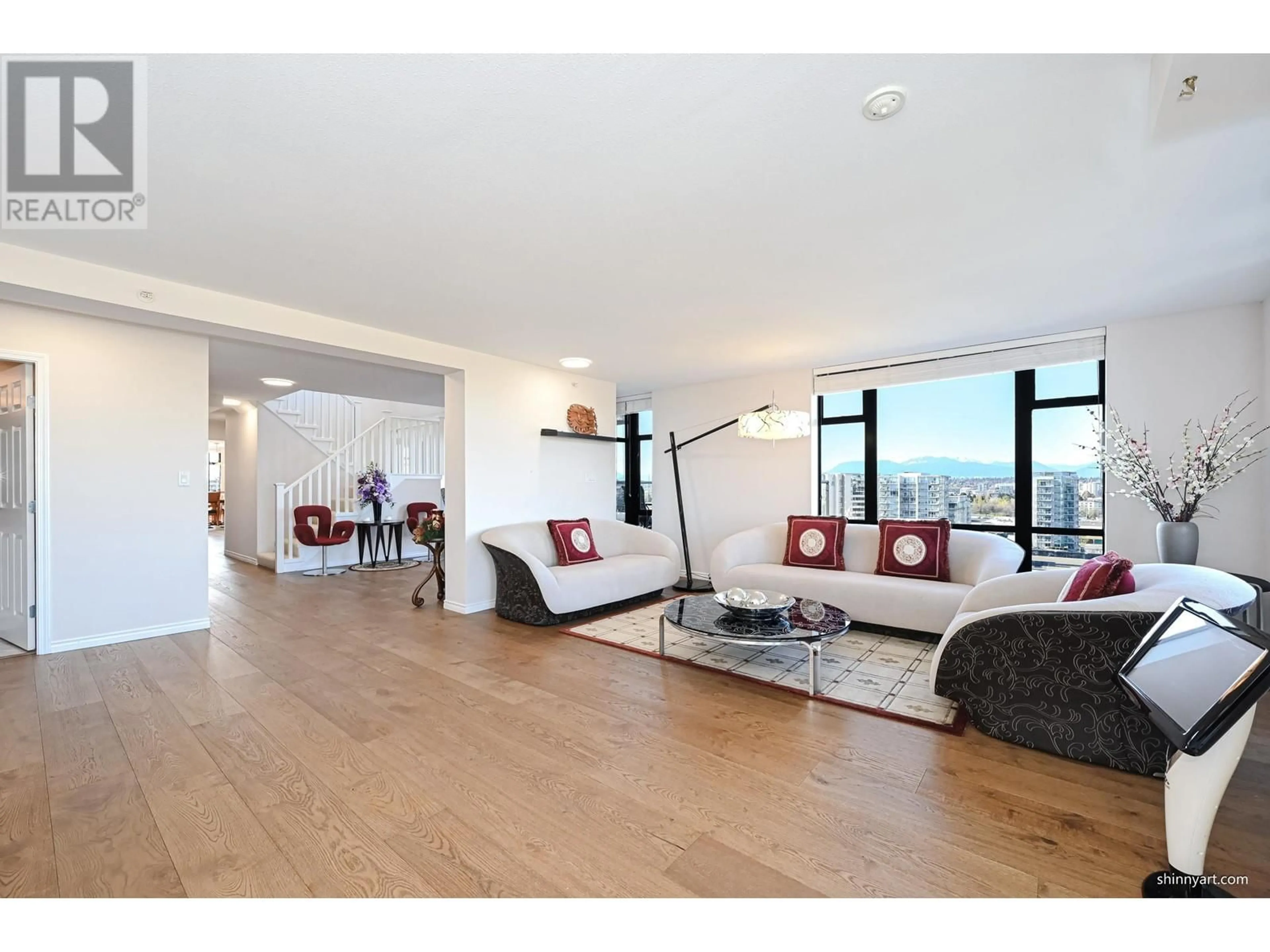 Living room with furniture, wood/laminate floor for 1702 - 5933 COONEY ROAD, Richmond British Columbia V6X4H3