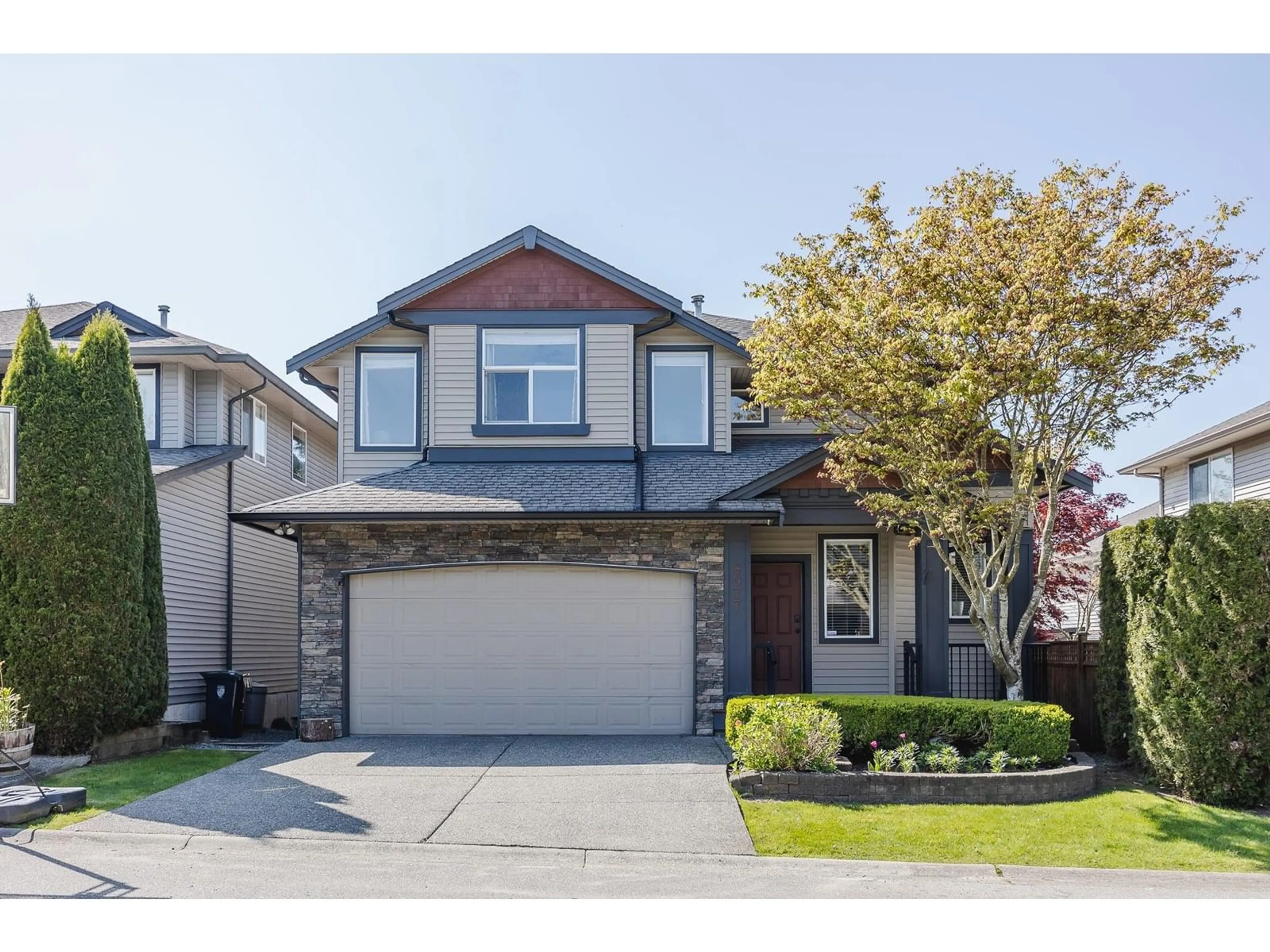 Home with vinyl exterior material, street for 8977 217, Langley British Columbia V1M4C7