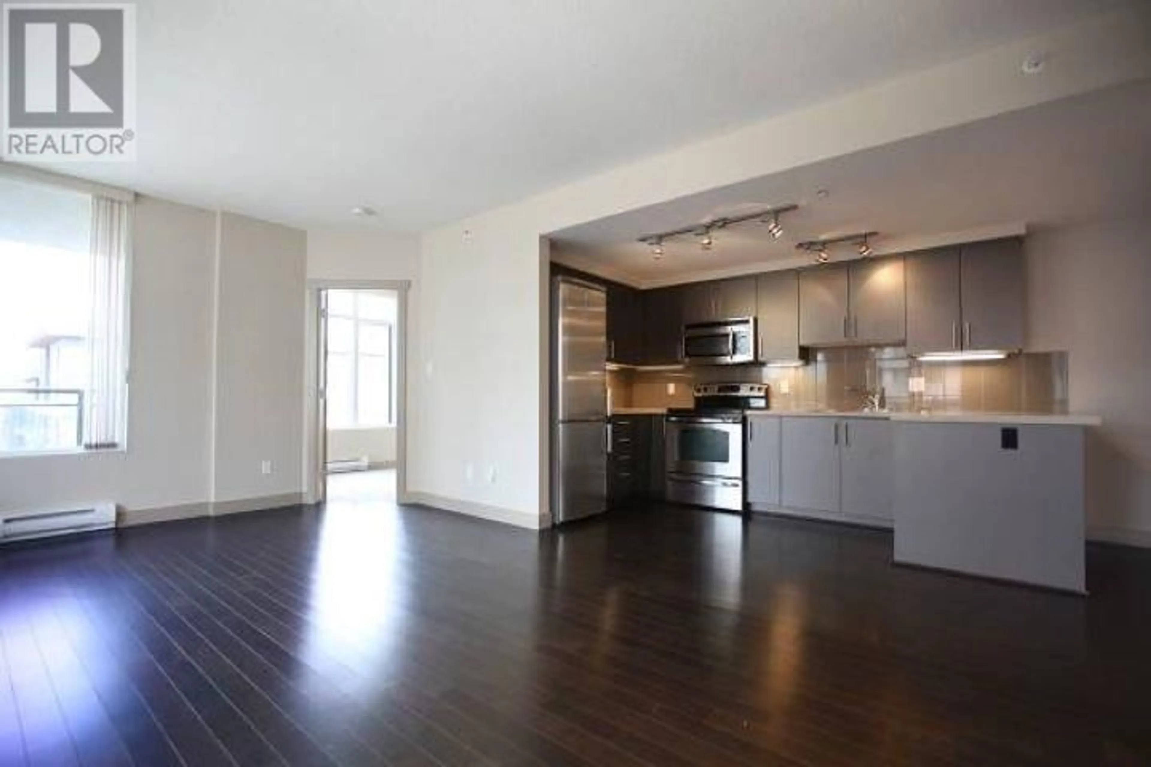Open concept kitchen, wood/laminate floor for 625 - 9009 CORNERSTONE MEWS, Burnaby British Columbia V5A0B9