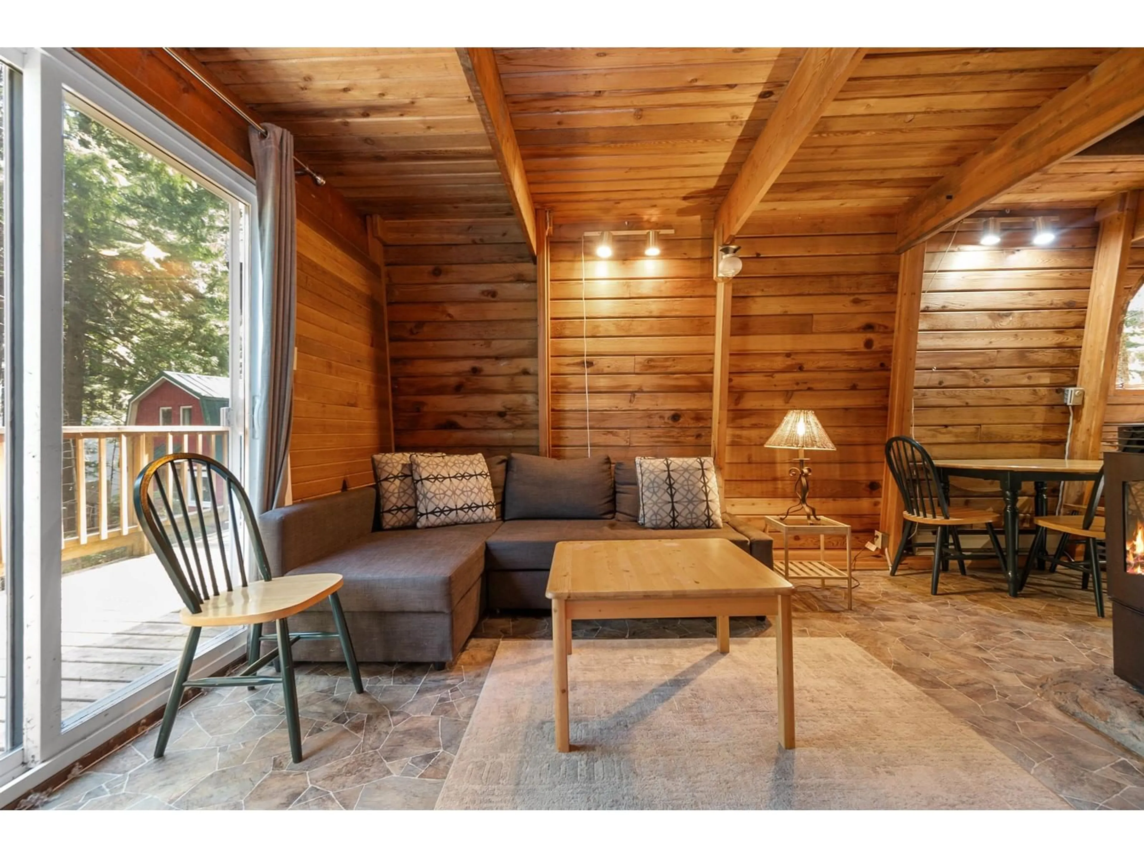 Living room with furniture, wood/laminate floor for 71649 PITCH PLACE, Sunshine Valley British Columbia V0X1L5