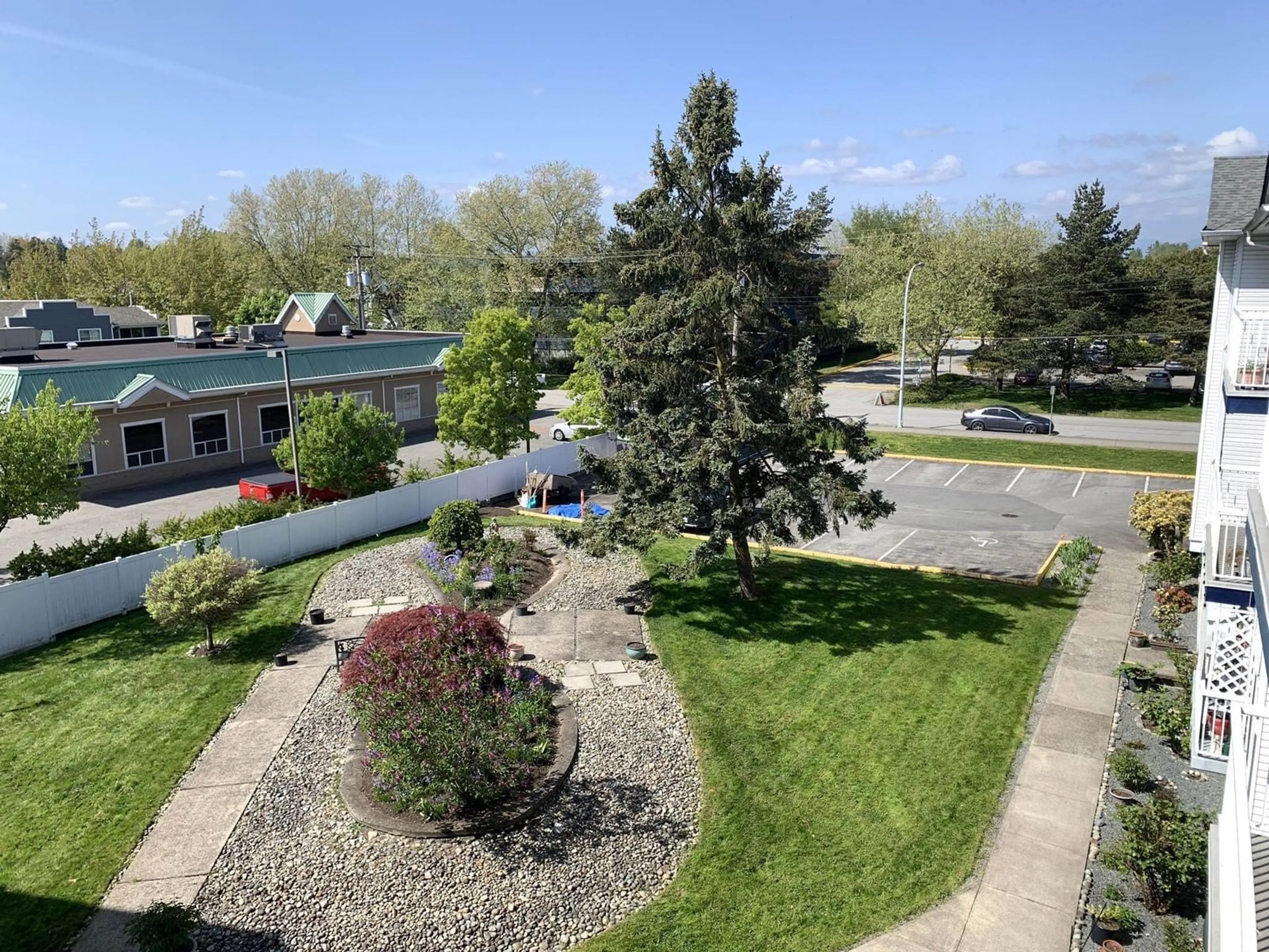 A pic from outside/outdoor area/front of a property/back of a property/a pic from drone, unknown for 309 - 17695 58, Surrey British Columbia V3S1L5