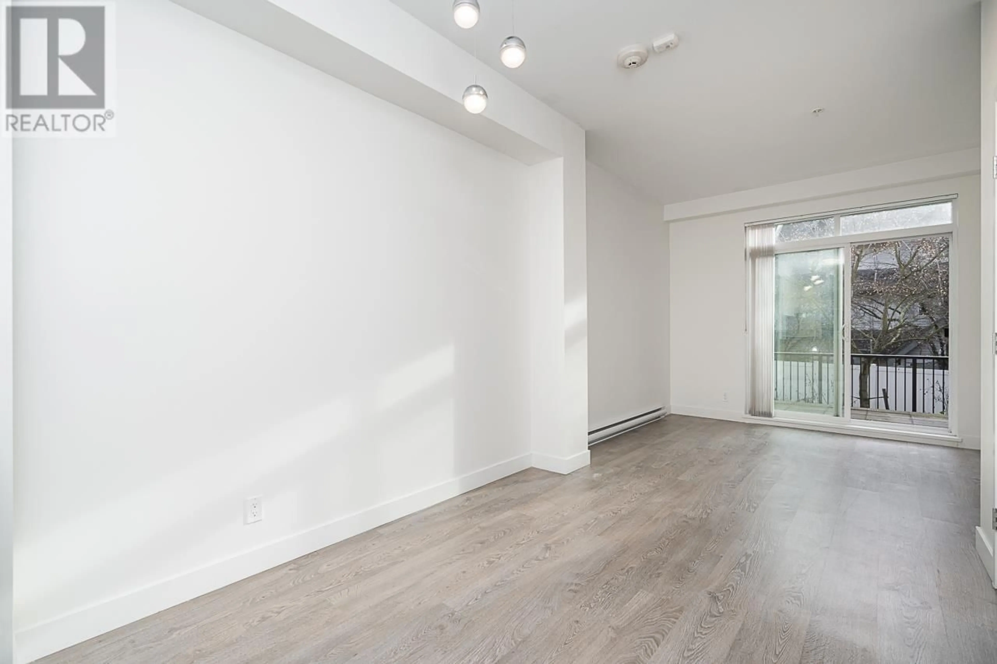 A pic of a room for 112 - 7250 18TH AVENUE, Burnaby British Columbia V3N1H3