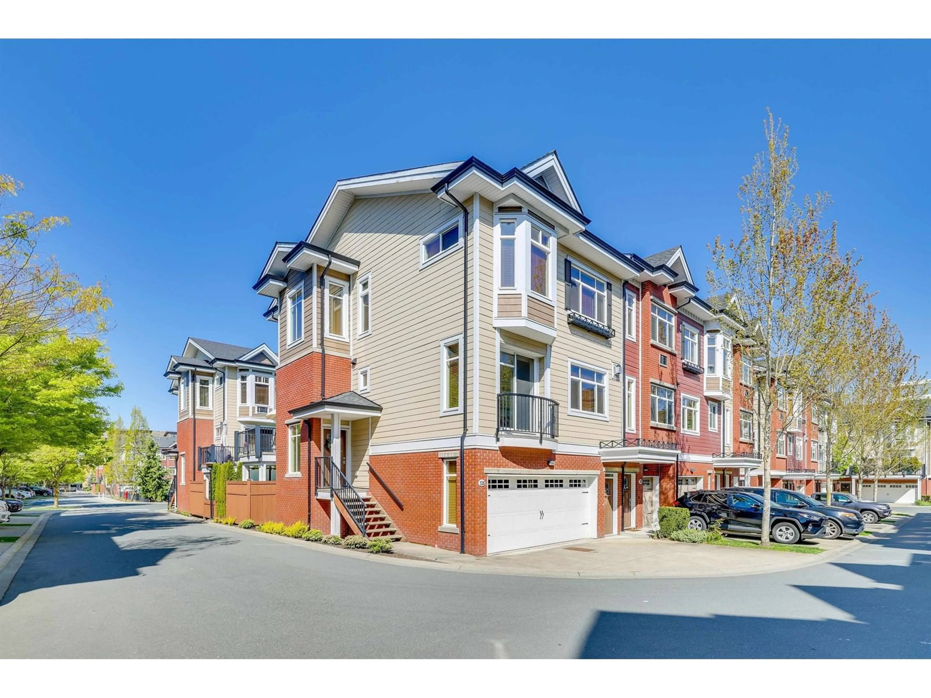 A pic from outside/outdoor area/front of a property/back of a property/a pic from drone, street for 126 - 8068 207, Langley British Columbia V2Y0M9