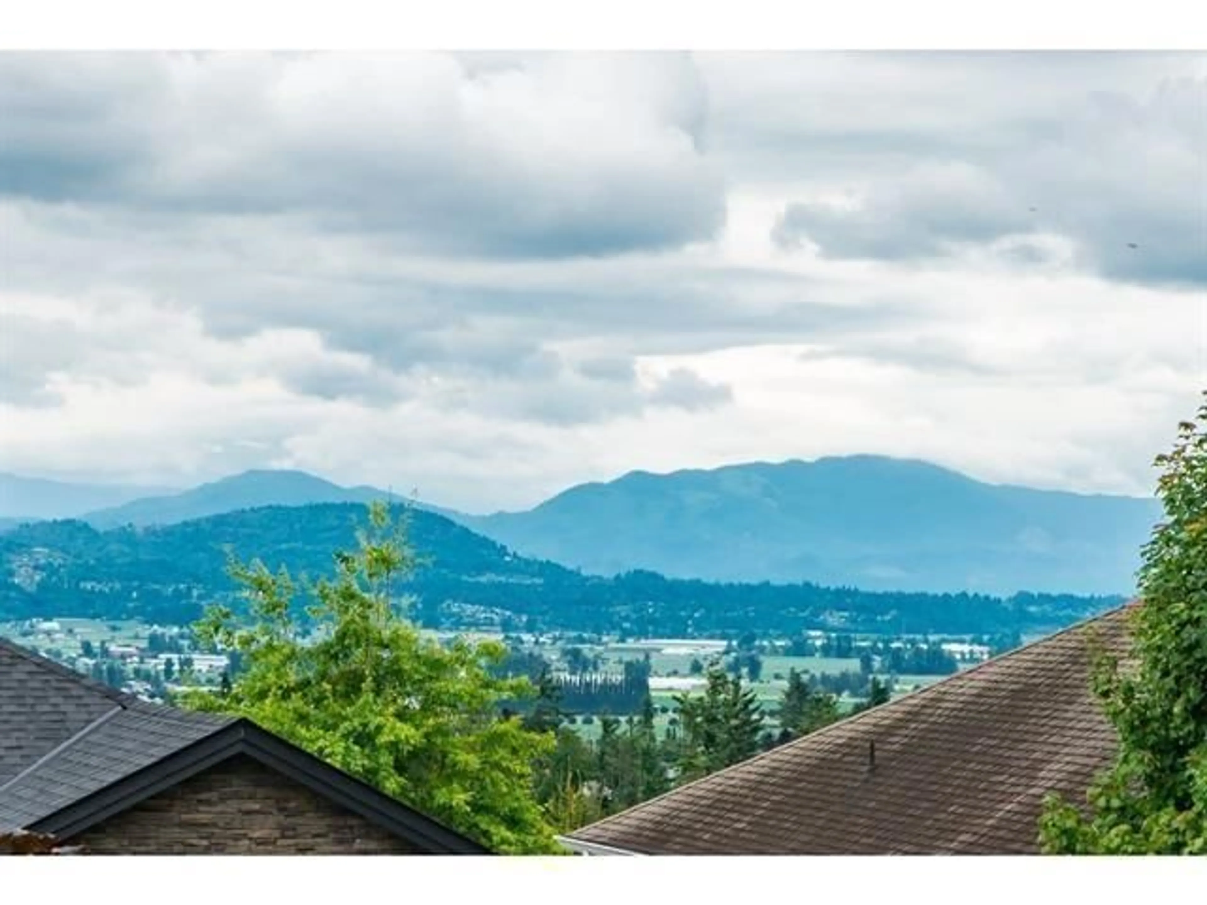 A pic from outside/outdoor area/front of a property/back of a property/a pic from drone, mountain view for 33577 12, Mission British Columbia V2V6Z6