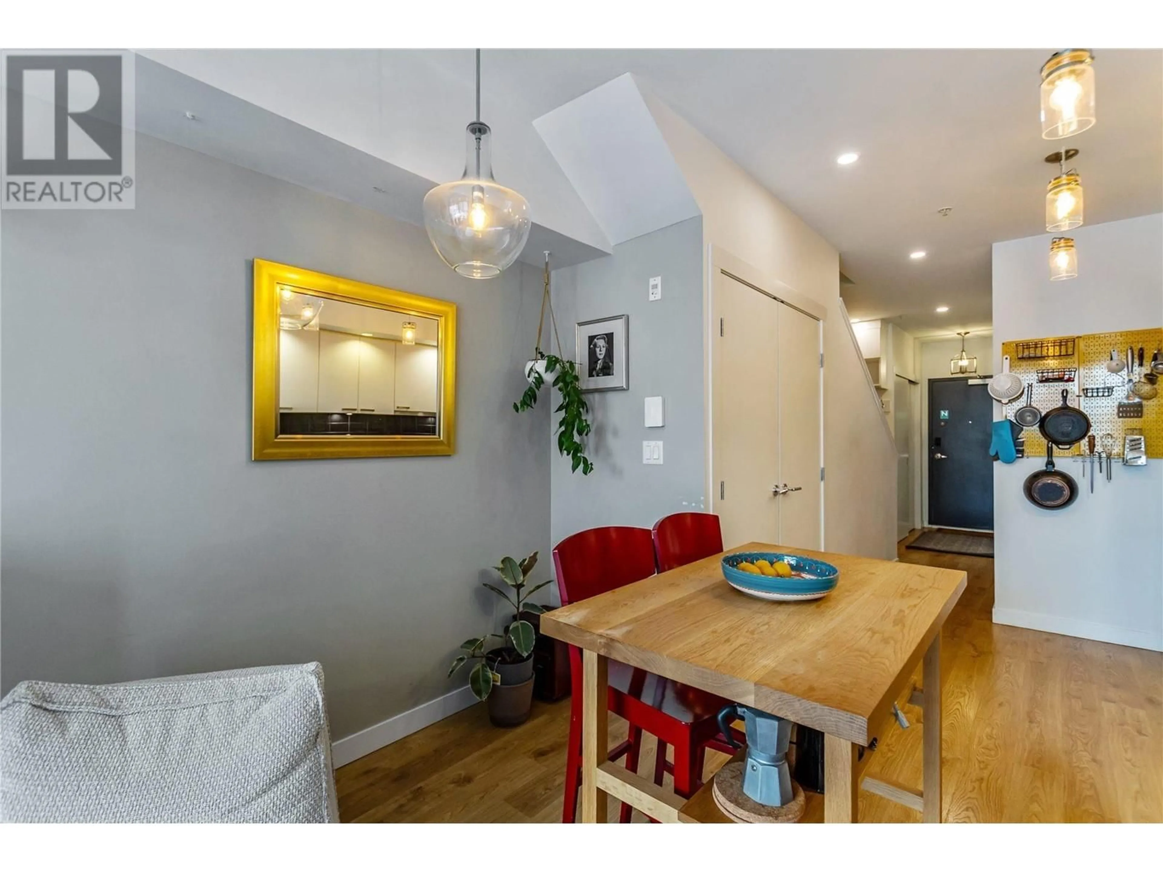 Dining room, wood/laminate floor for 304 - 557 CORDOVA STREET, Vancouver British Columbia V6A1L8