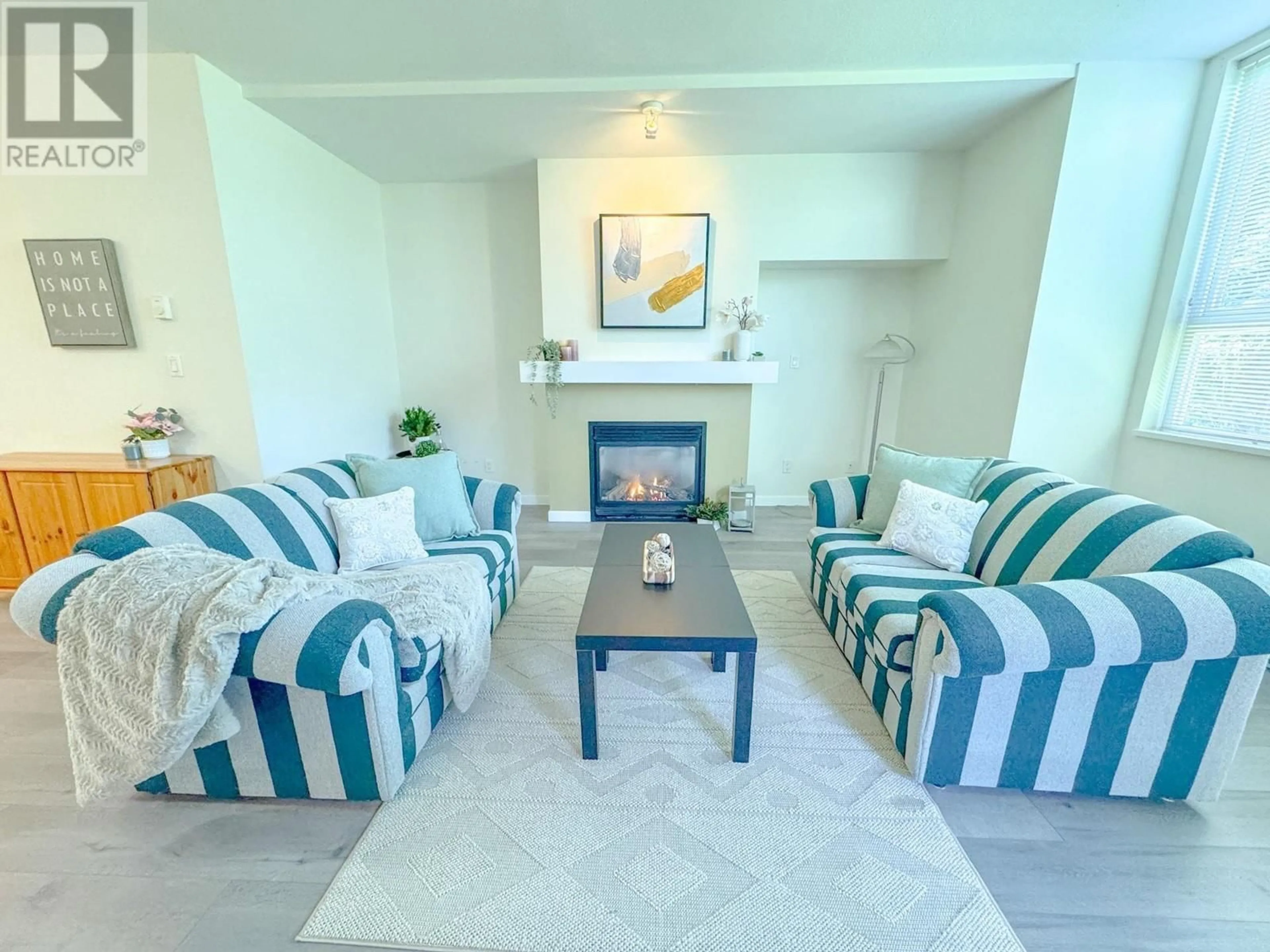 Living room with furniture, unknown for 104 - 7089 MONT ROYAL SQUARE, Vancouver British Columbia V5S4W6