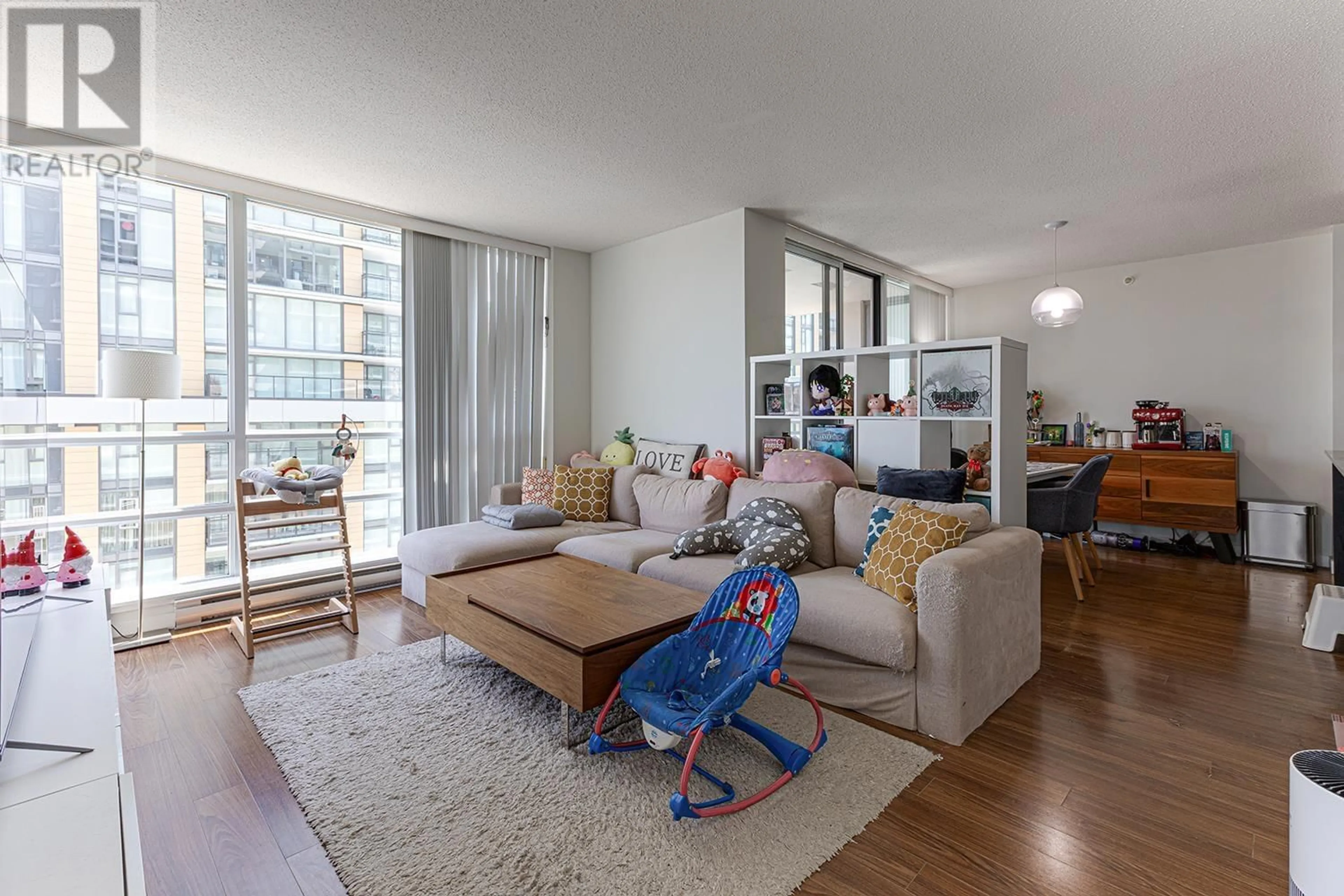 Living room with furniture, wood/laminate floor for 904 - 3111 CORVETTE WAY, Richmond British Columbia V6X4K3