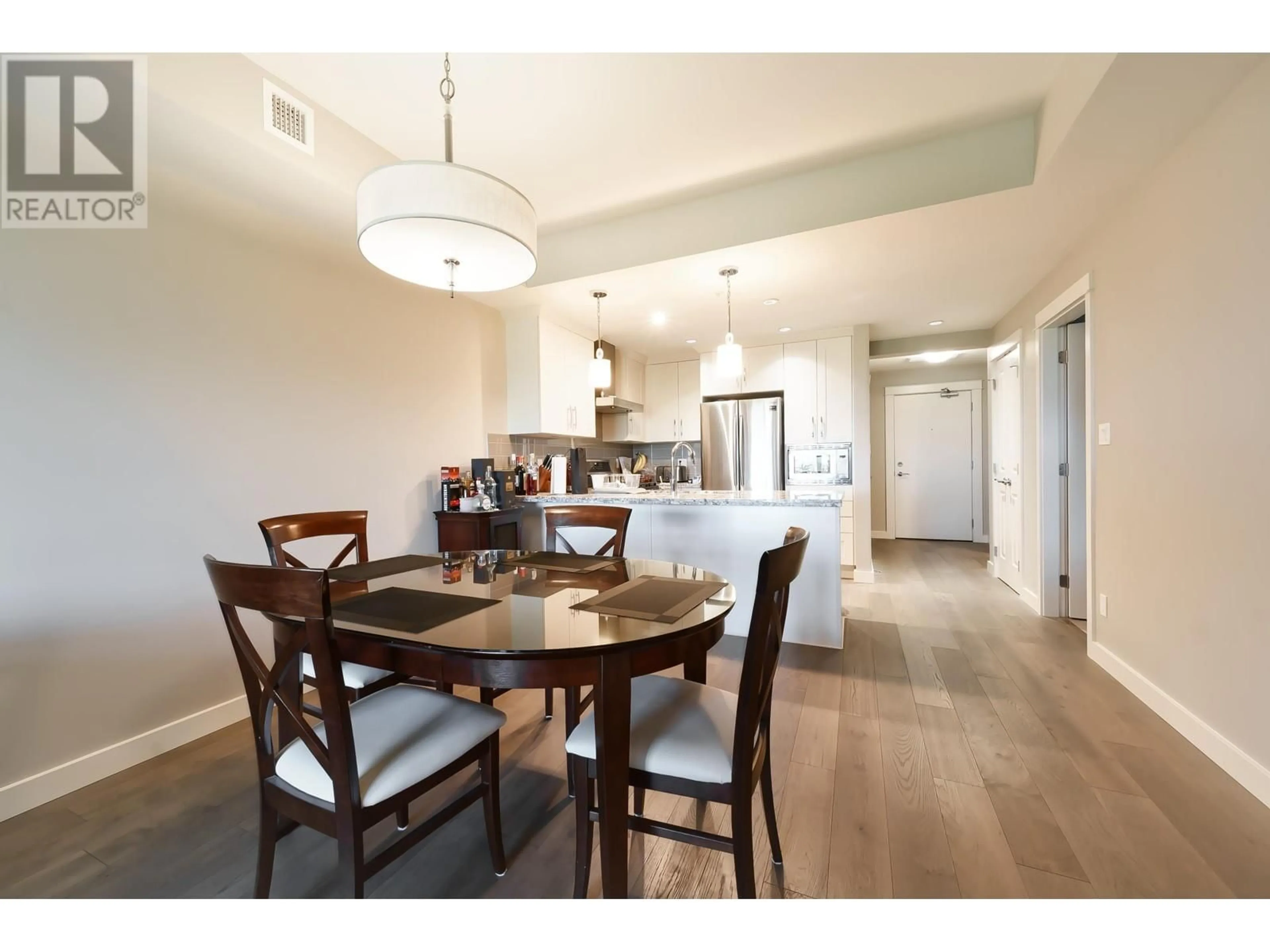 Dining room, wood/laminate floor for 207 - 4977 SPRINGS BOULEVARD, Tsawwassen British Columbia V4M0C1