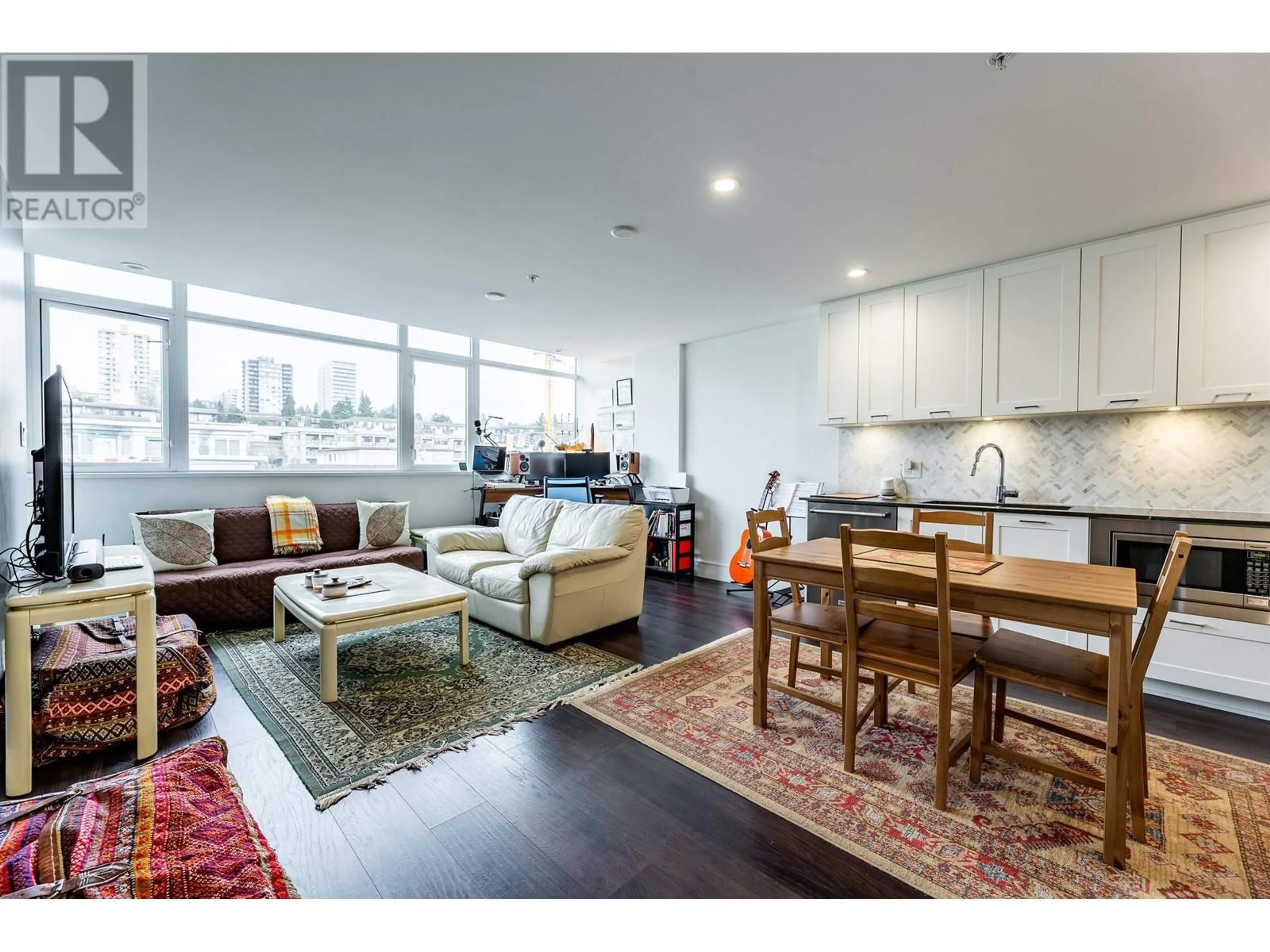 Living room with furniture, wood/laminate floor for 506 - 131 3RD STREET, North Vancouver British Columbia V7L0E3