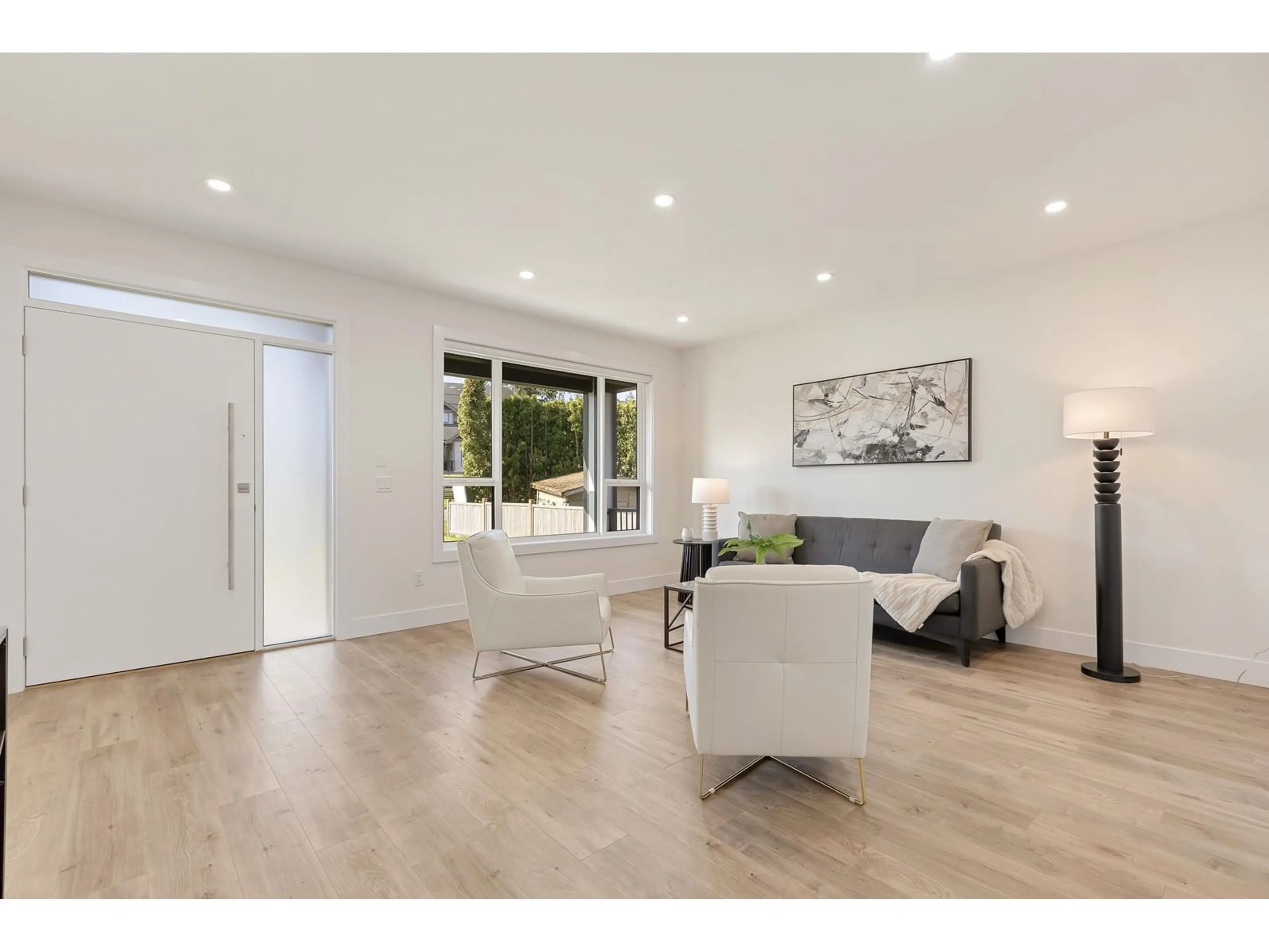 Living room with furniture, wood/laminate floor for 1 - 23809 OLD YALE, Langley British Columbia V2Z2K4