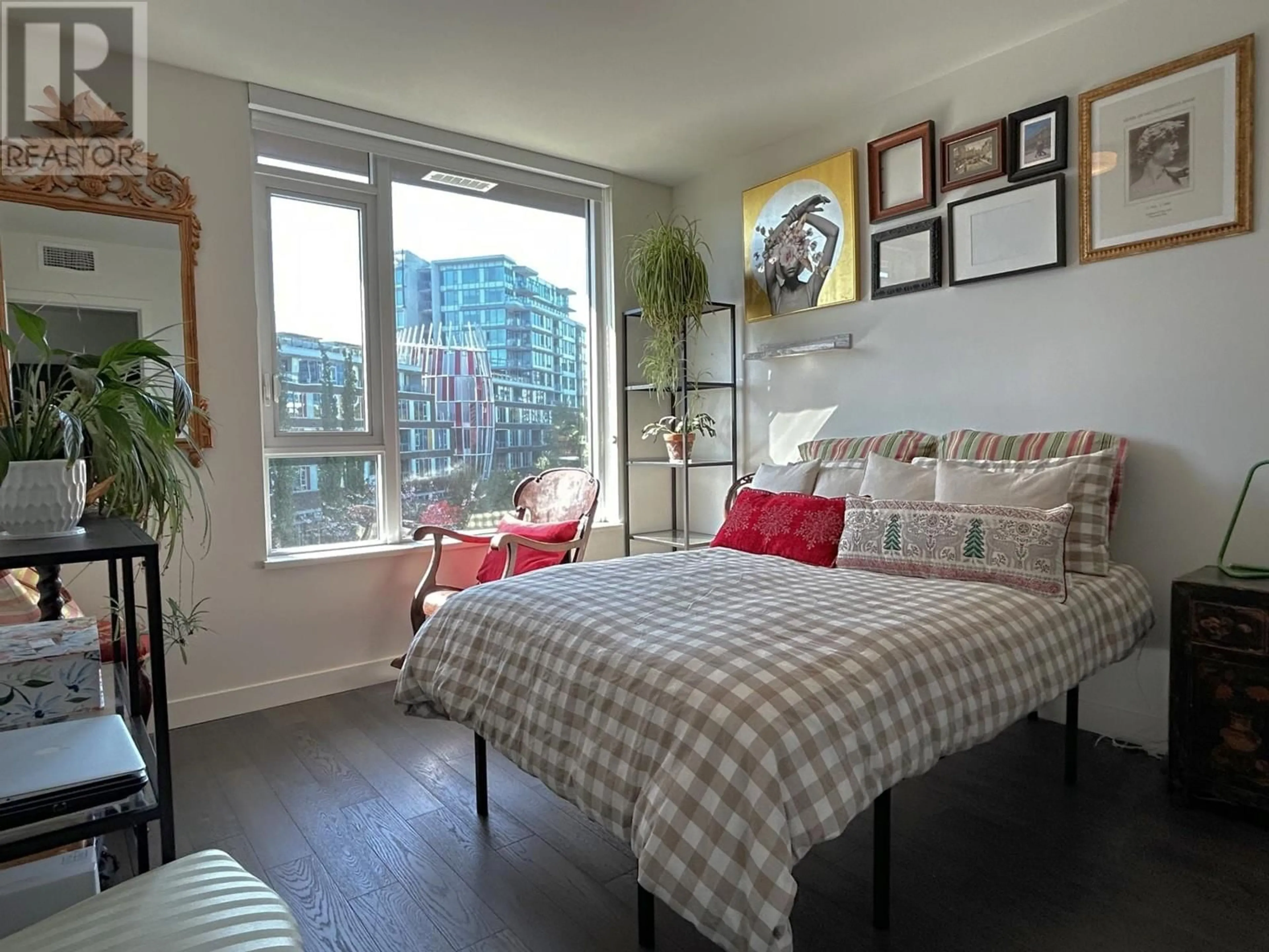 Bedroom with bed, wood/laminate floor for 317 - 7468 LANSDOWNE ROAD, Richmond British Columbia V7C0B7