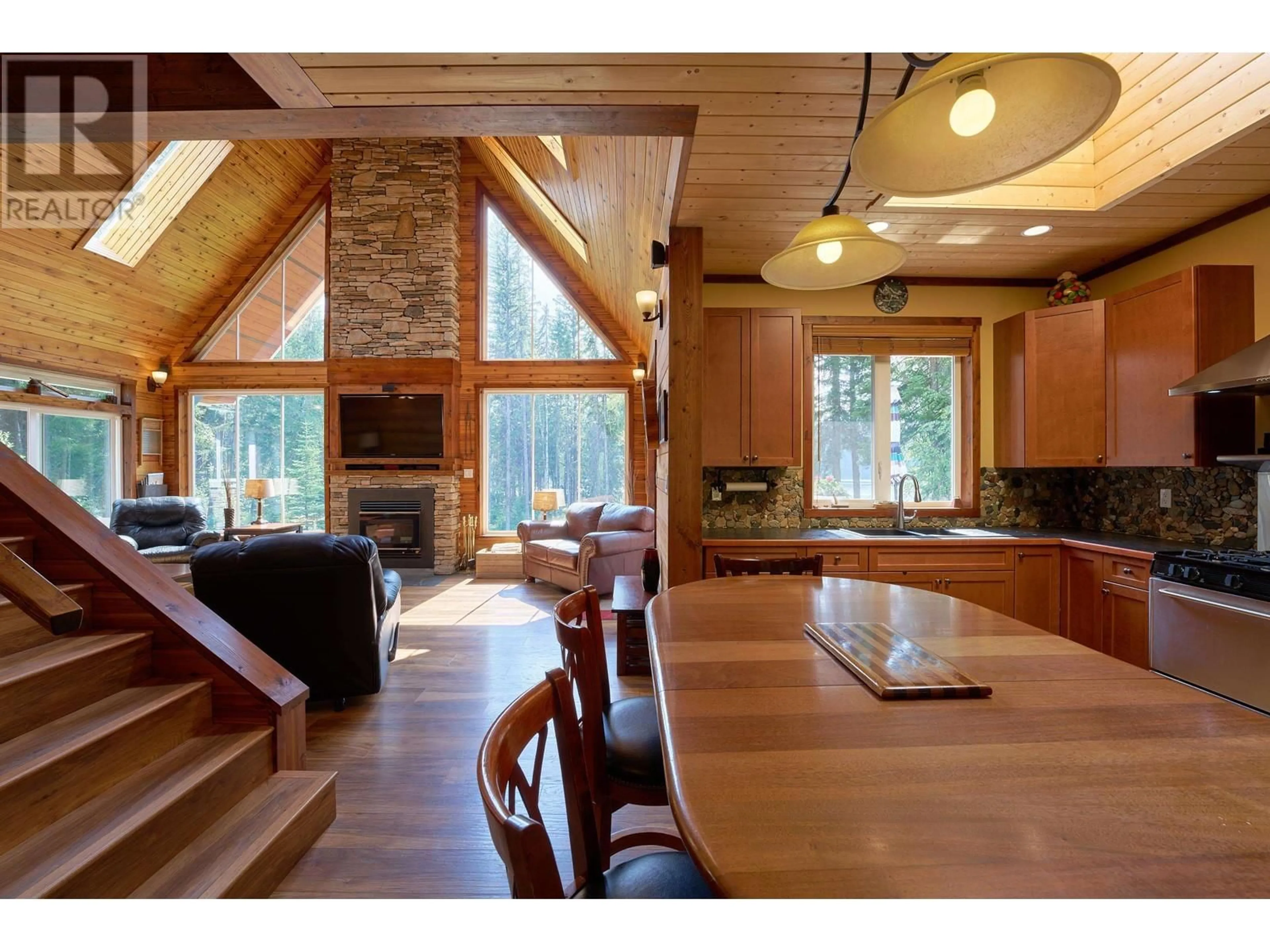 Open concept kitchen, wood/laminate floor for 6777 MCKINLEY TRAIL, Horsefly British Columbia V0L1L0