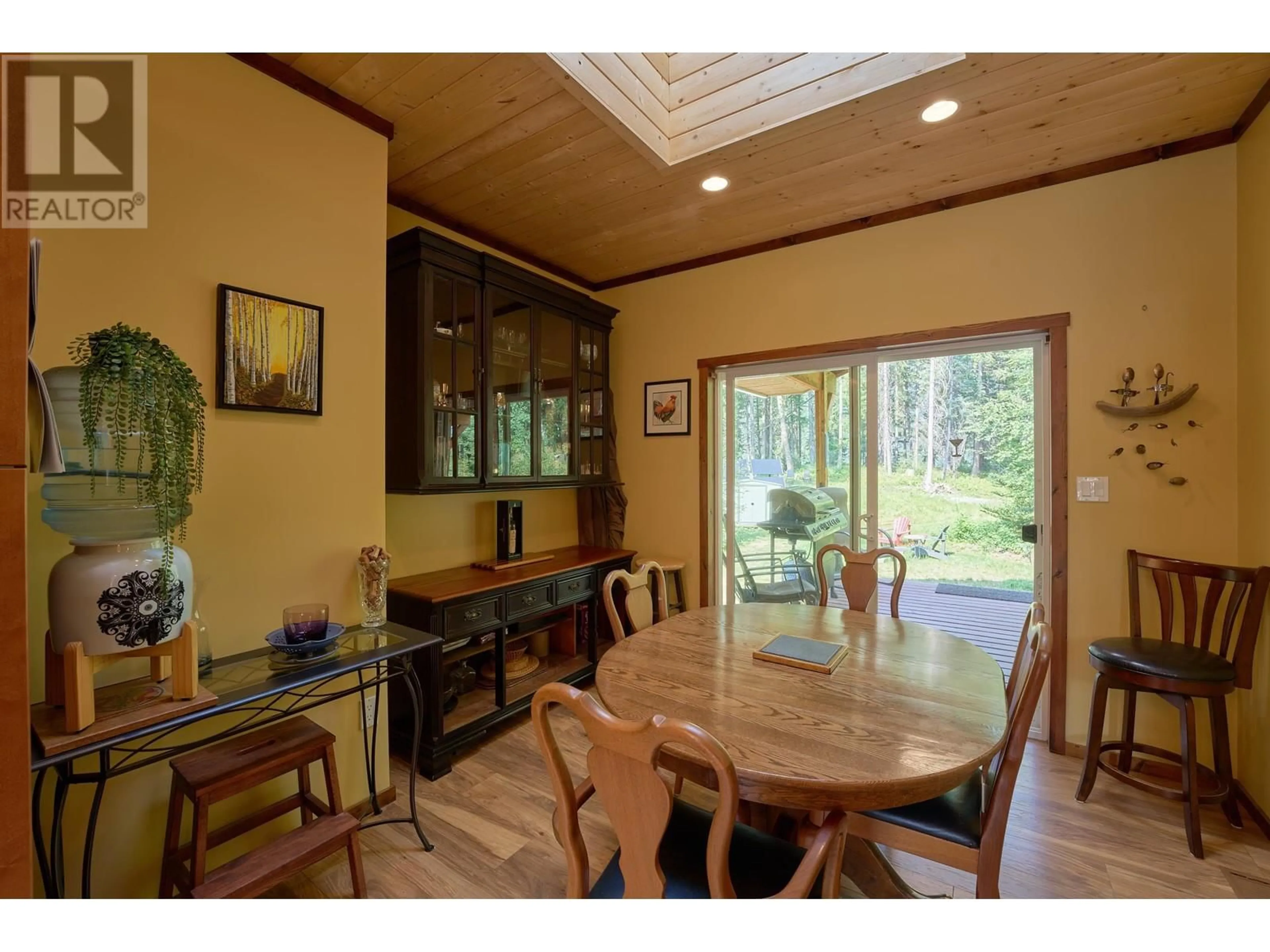 Dining room, wood/laminate floor for 6777 MCKINLEY TRAIL, Horsefly British Columbia V0L1L0