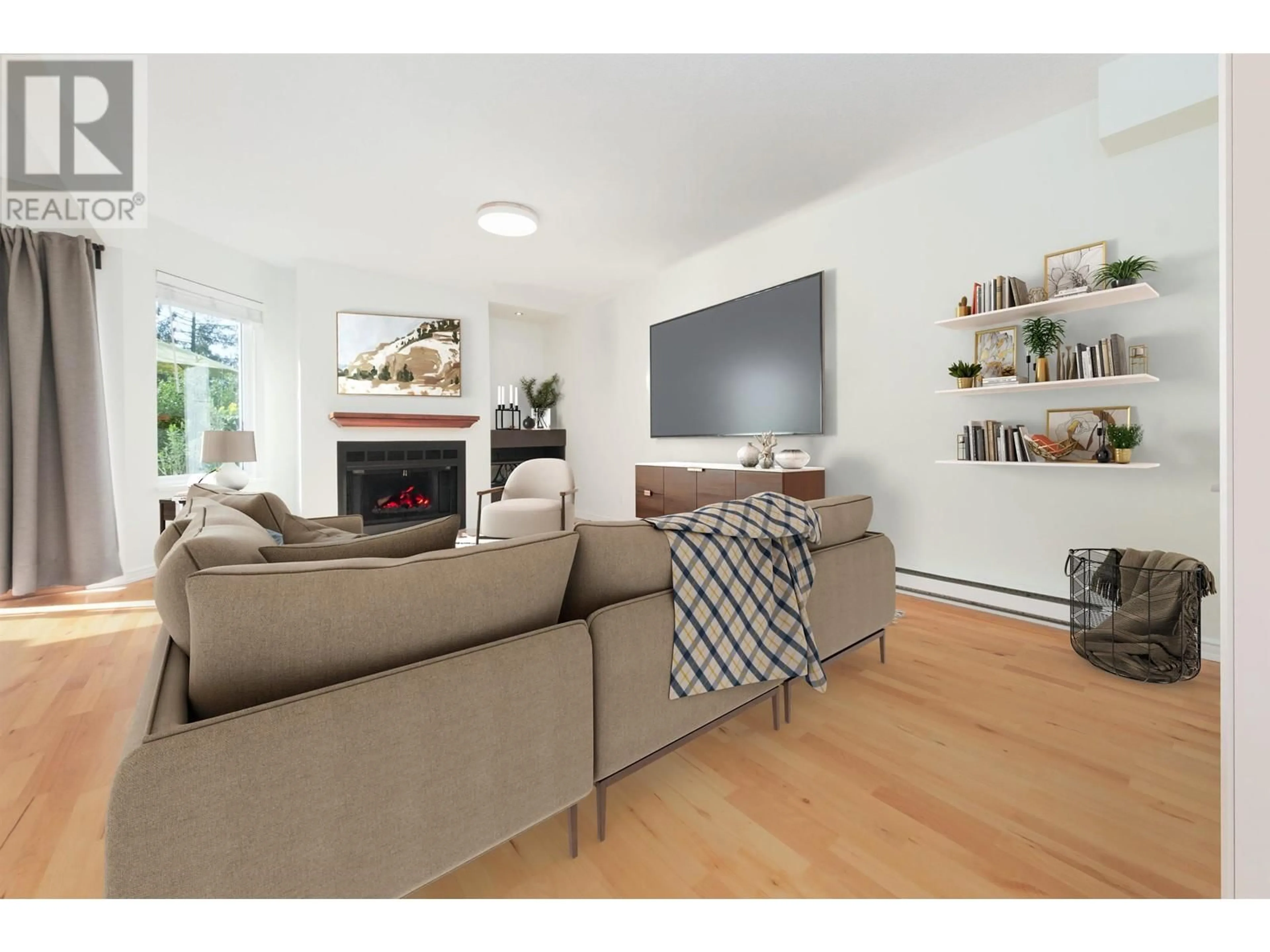 Living room with furniture, wood/laminate floor for 3468 WEYMOOR PLACE, Vancouver British Columbia V5S4G5