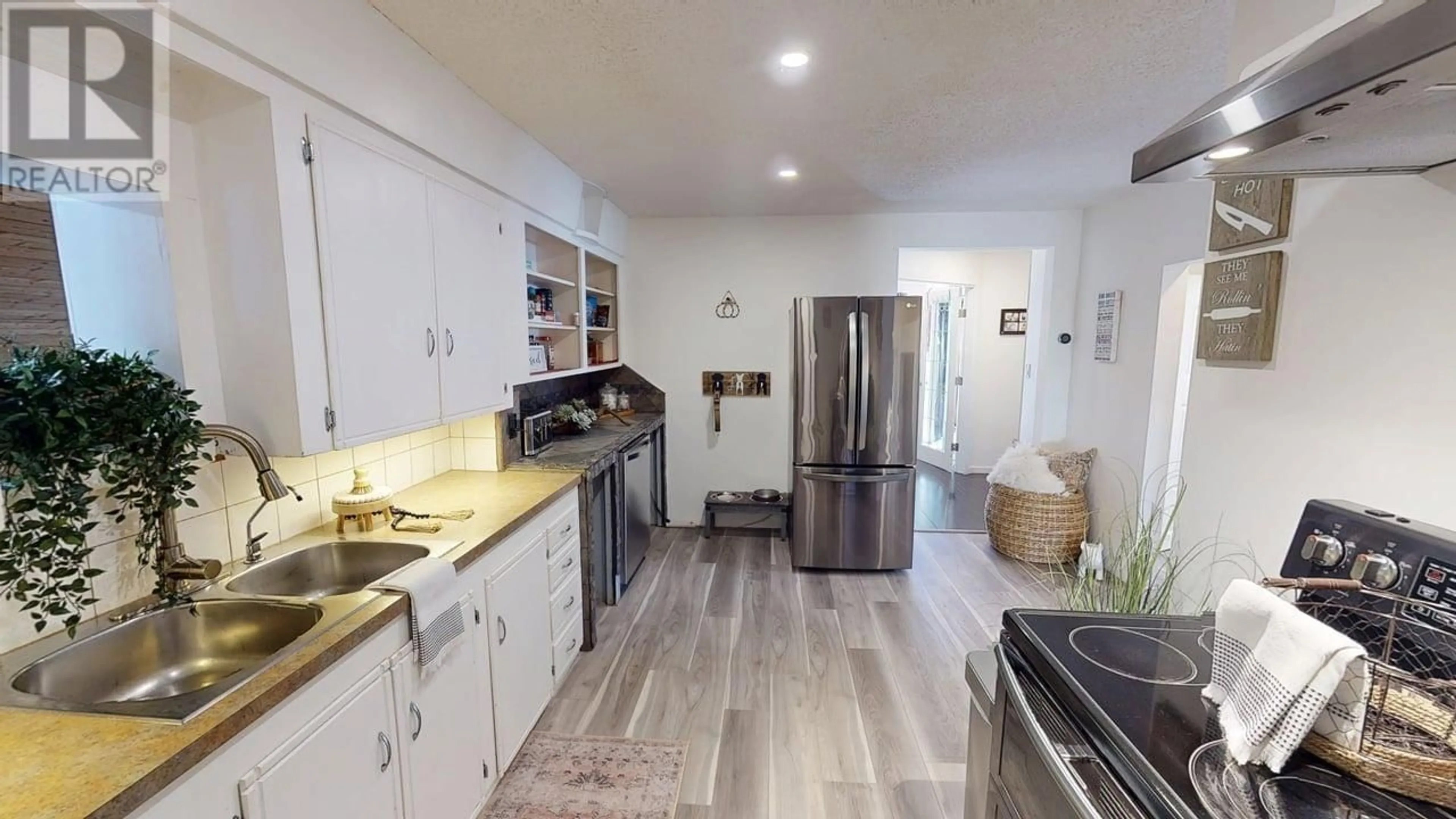 Open concept kitchen, unknown for 7924 95 AVENUE, Fort St. John British Columbia V1J1G6