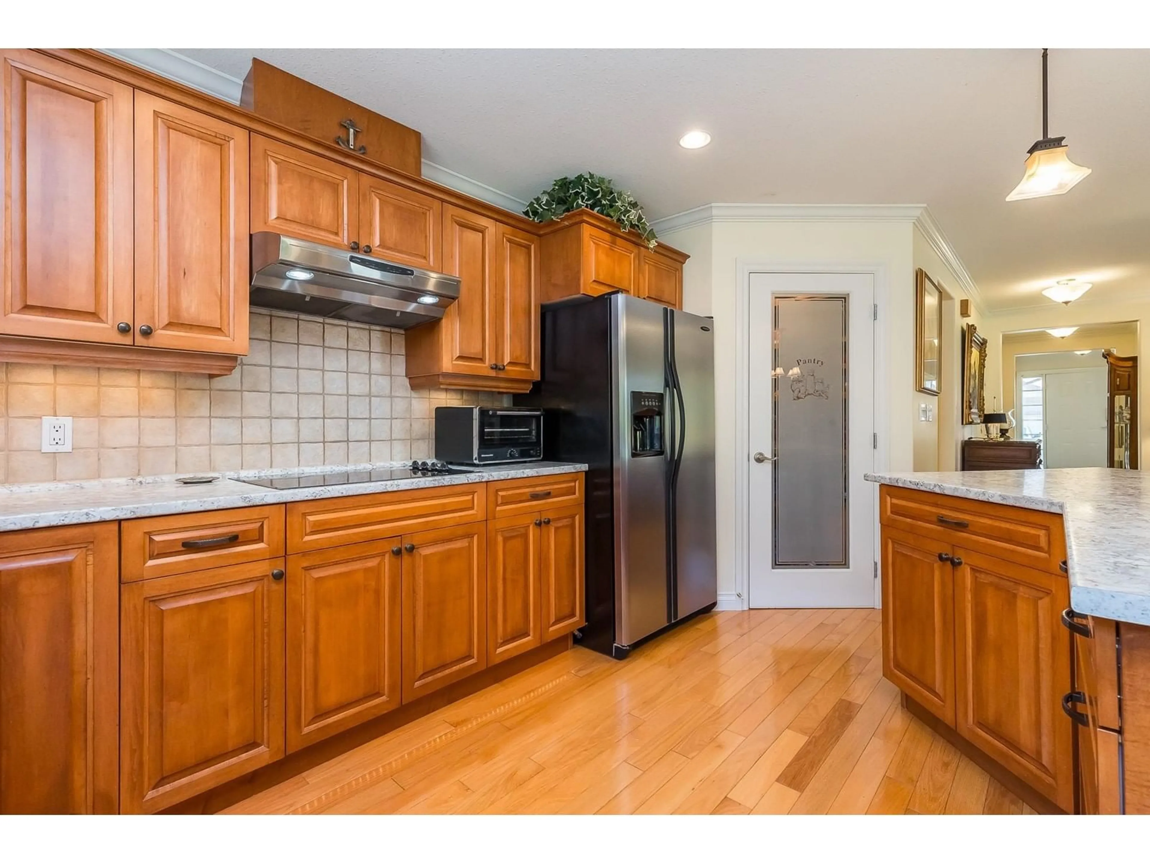 Open concept kitchen, wood/laminate floor for 198 - 46000 THOMAS ROAD, Chilliwack British Columbia V2R5W6