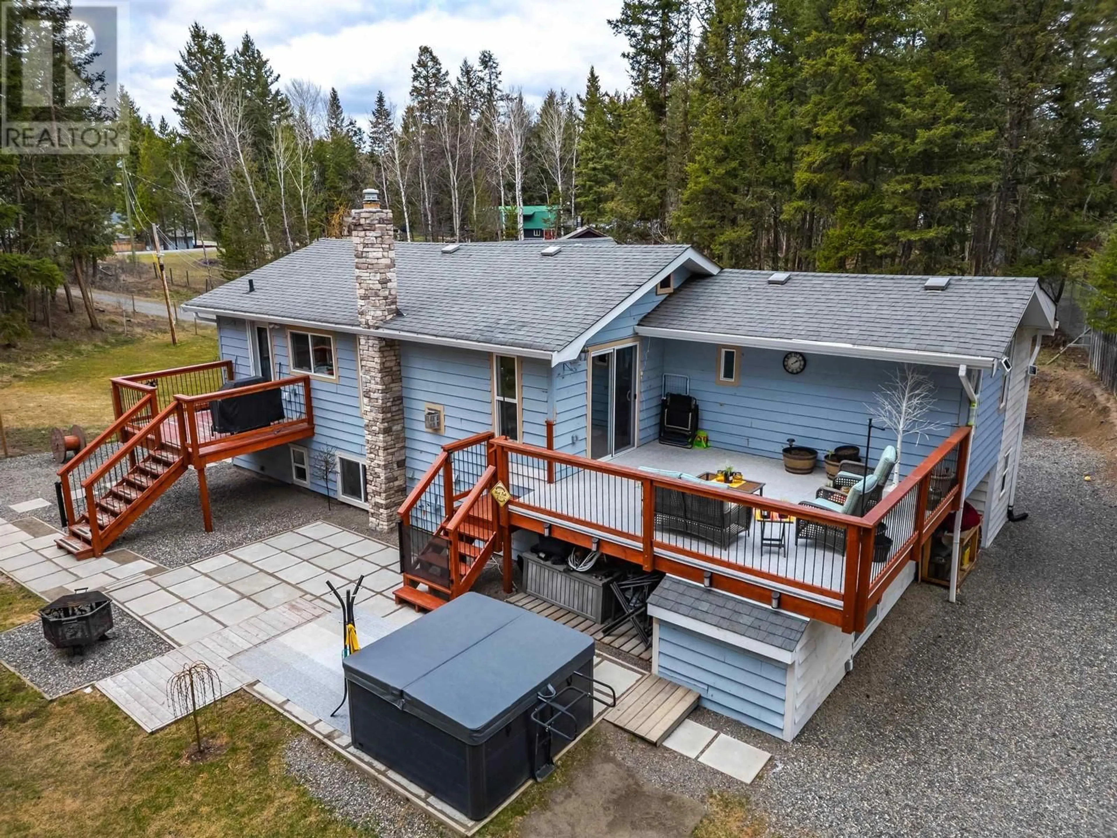 A pic from outside/outdoor area/front of a property/back of a property/a pic from drone, unknown for 4911 PEASIM COURT, 108 Mile Ranch British Columbia V0K2Z0