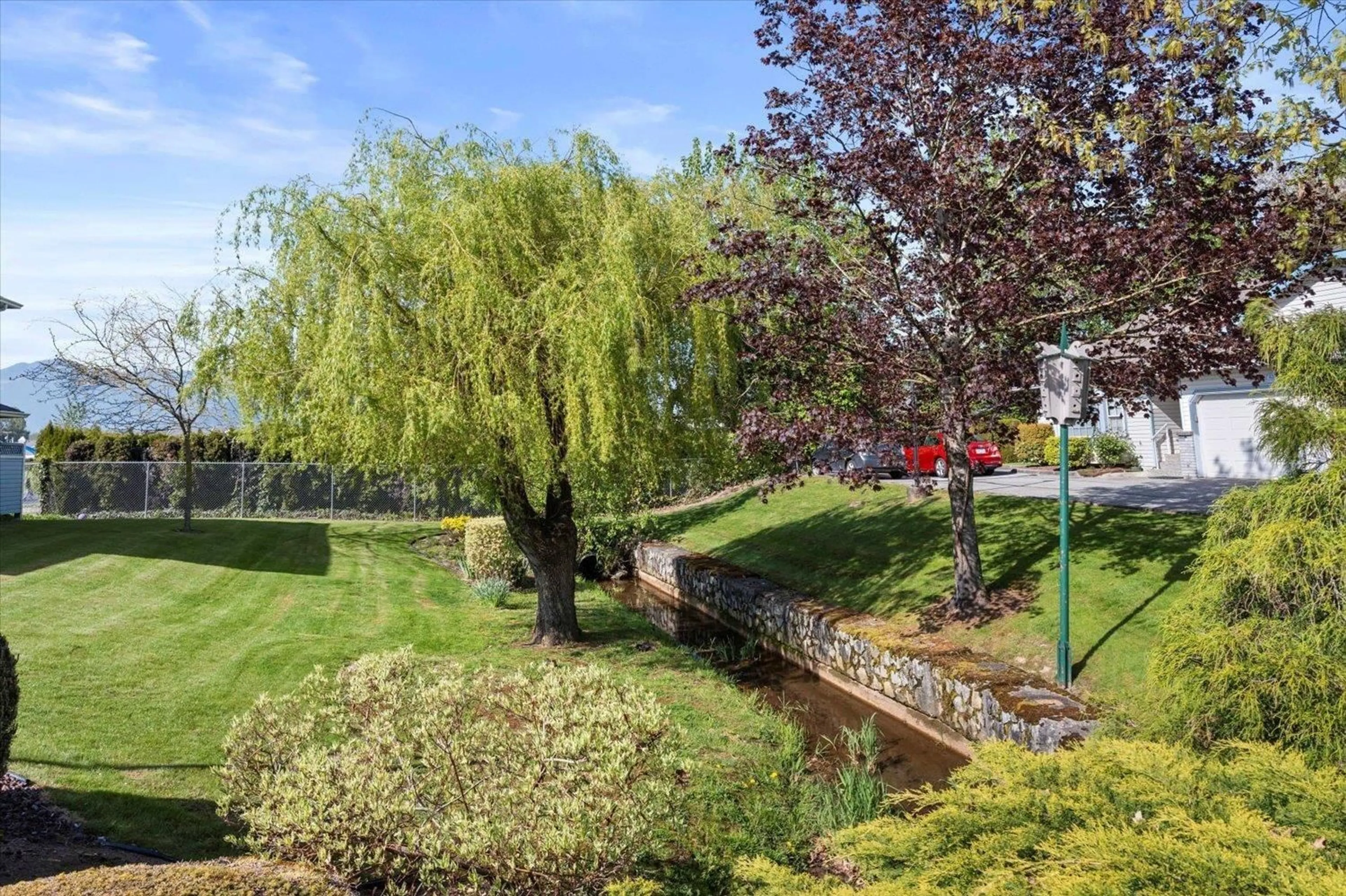 A pic from outside/outdoor area/front of a property/back of a property/a pic from drone, street for 46 - 45175 WELLS ROAD, Chilliwack British Columbia V2R3K7