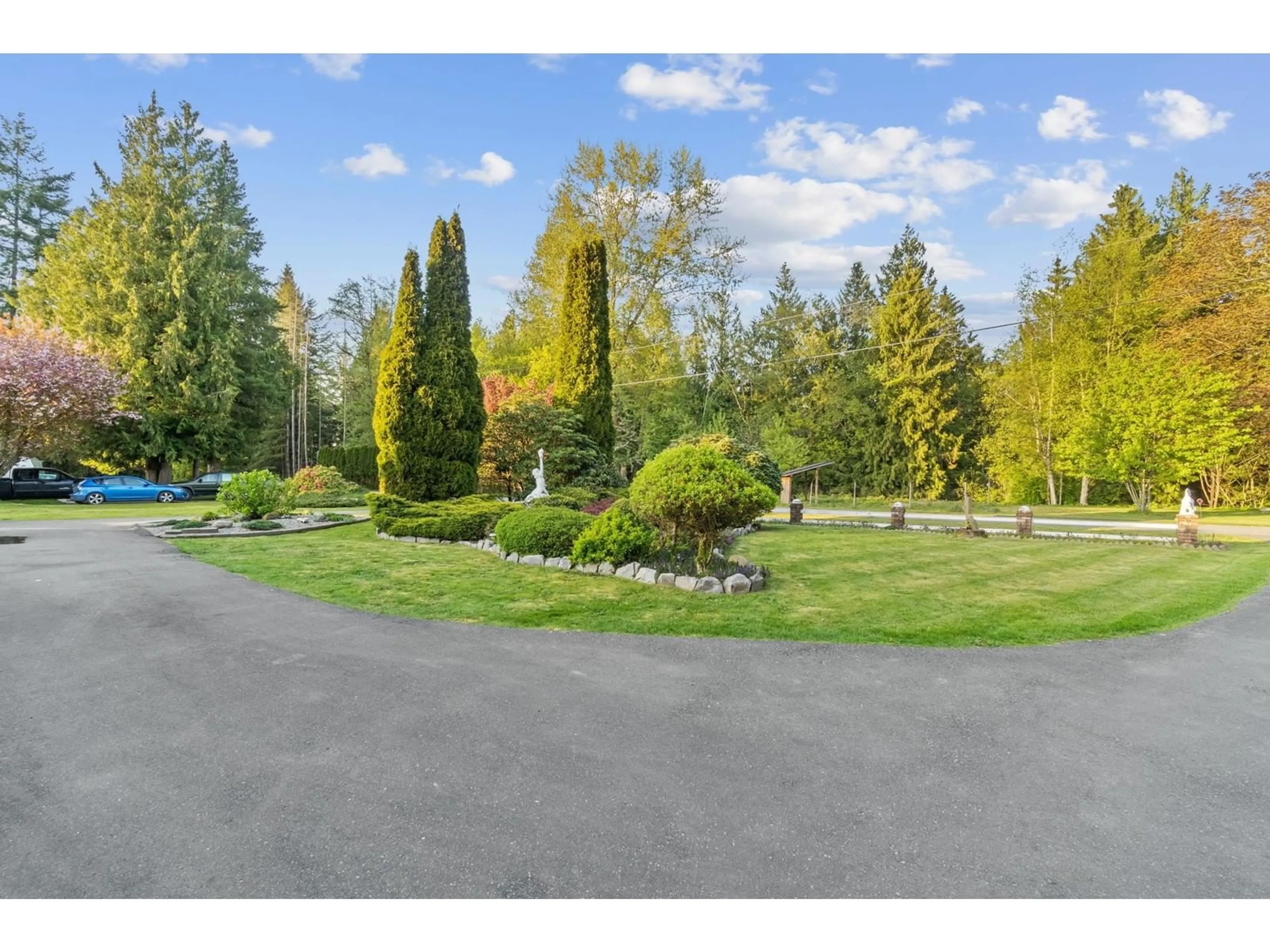 A pic from outside/outdoor area/front of a property/back of a property/a pic from drone, forest/trees view for 5465 247A, Langley British Columbia V2Z1C2