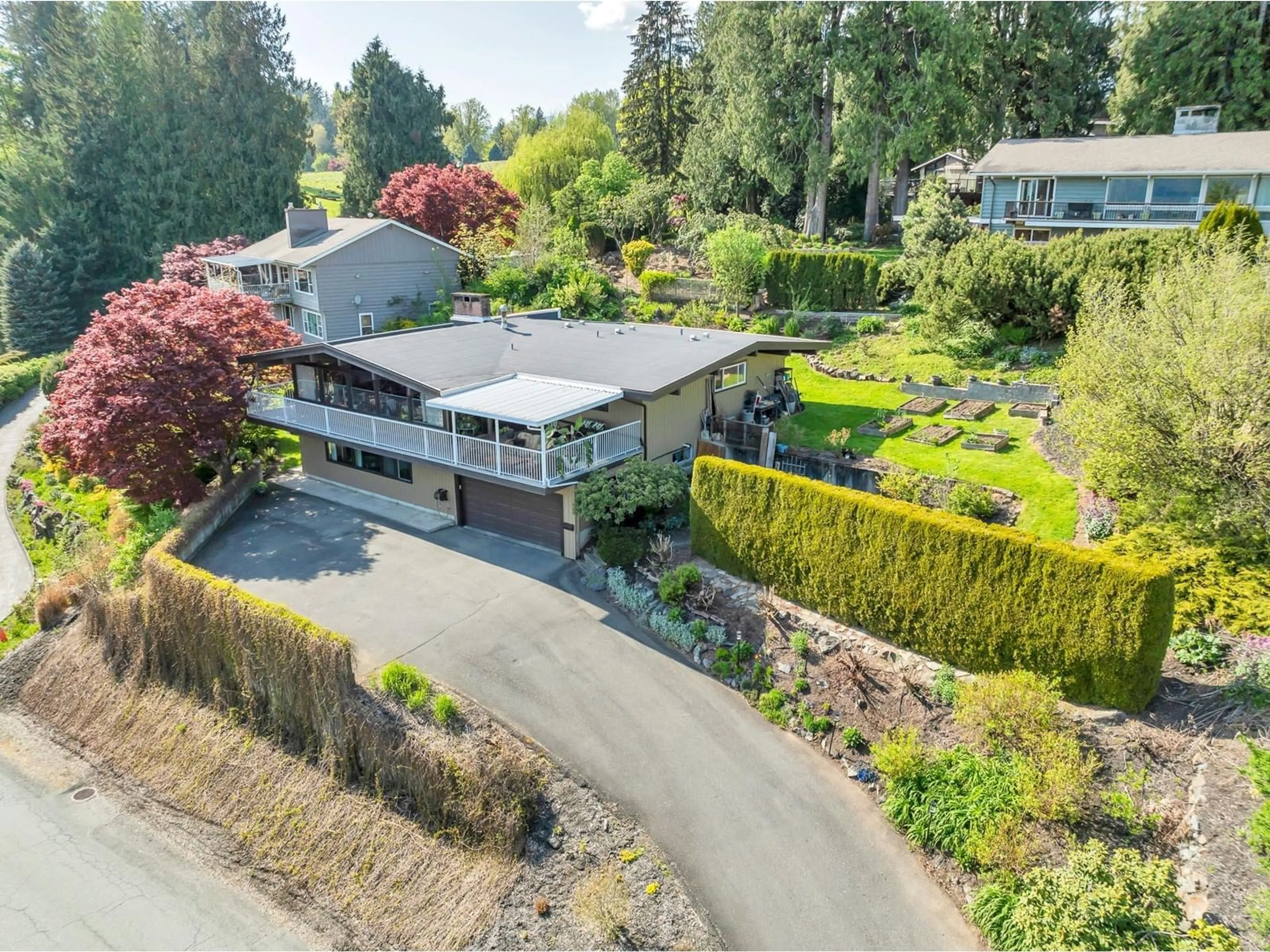 A pic from outside/outdoor area/front of a property/back of a property/a pic from drone, street for 9995 KENSWOOD DRIVE, Chilliwack British Columbia V2P7N5
