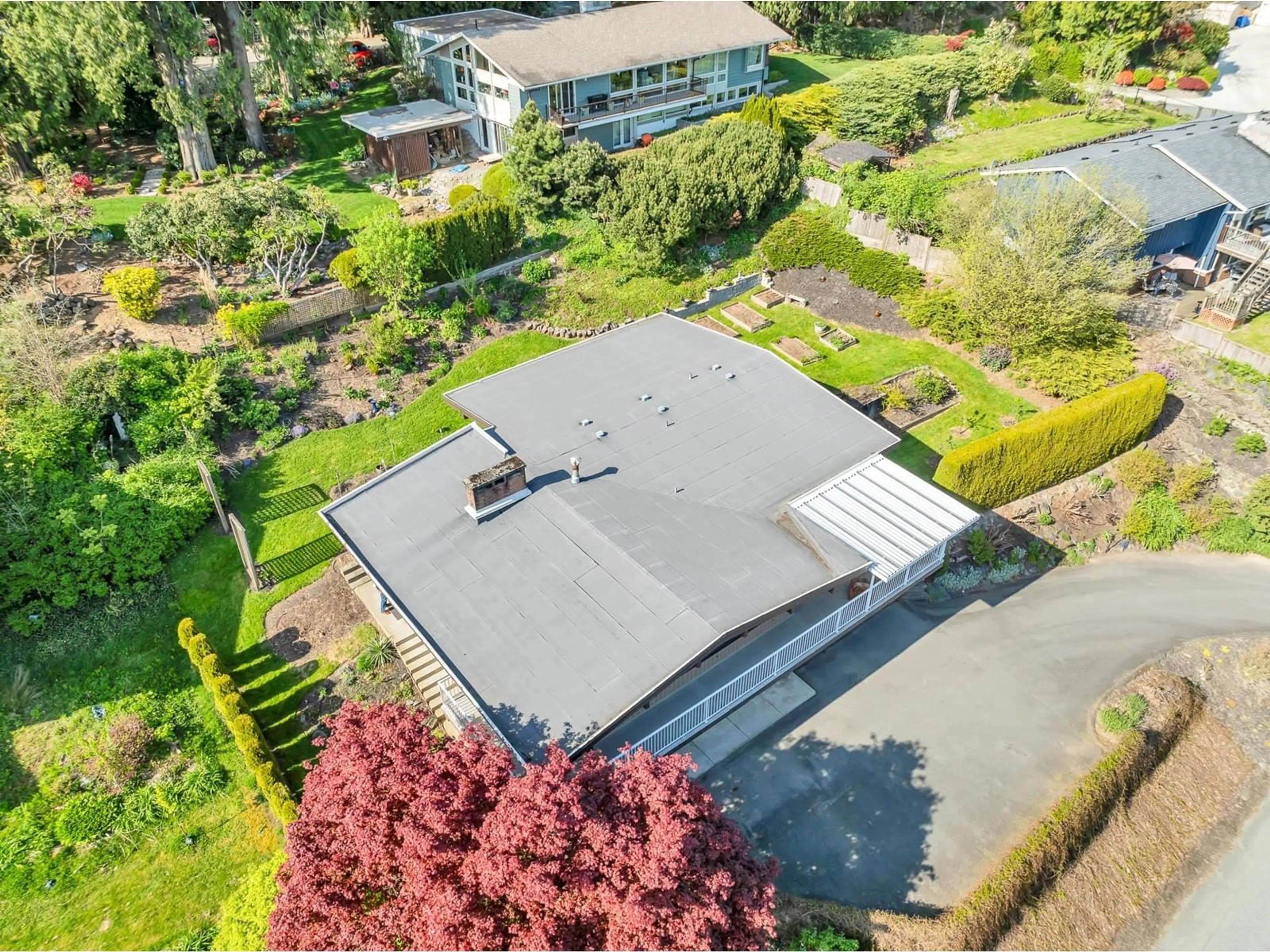 A pic from outside/outdoor area/front of a property/back of a property/a pic from drone, street for 9995 KENSWOOD DRIVE, Chilliwack British Columbia V2P7N5