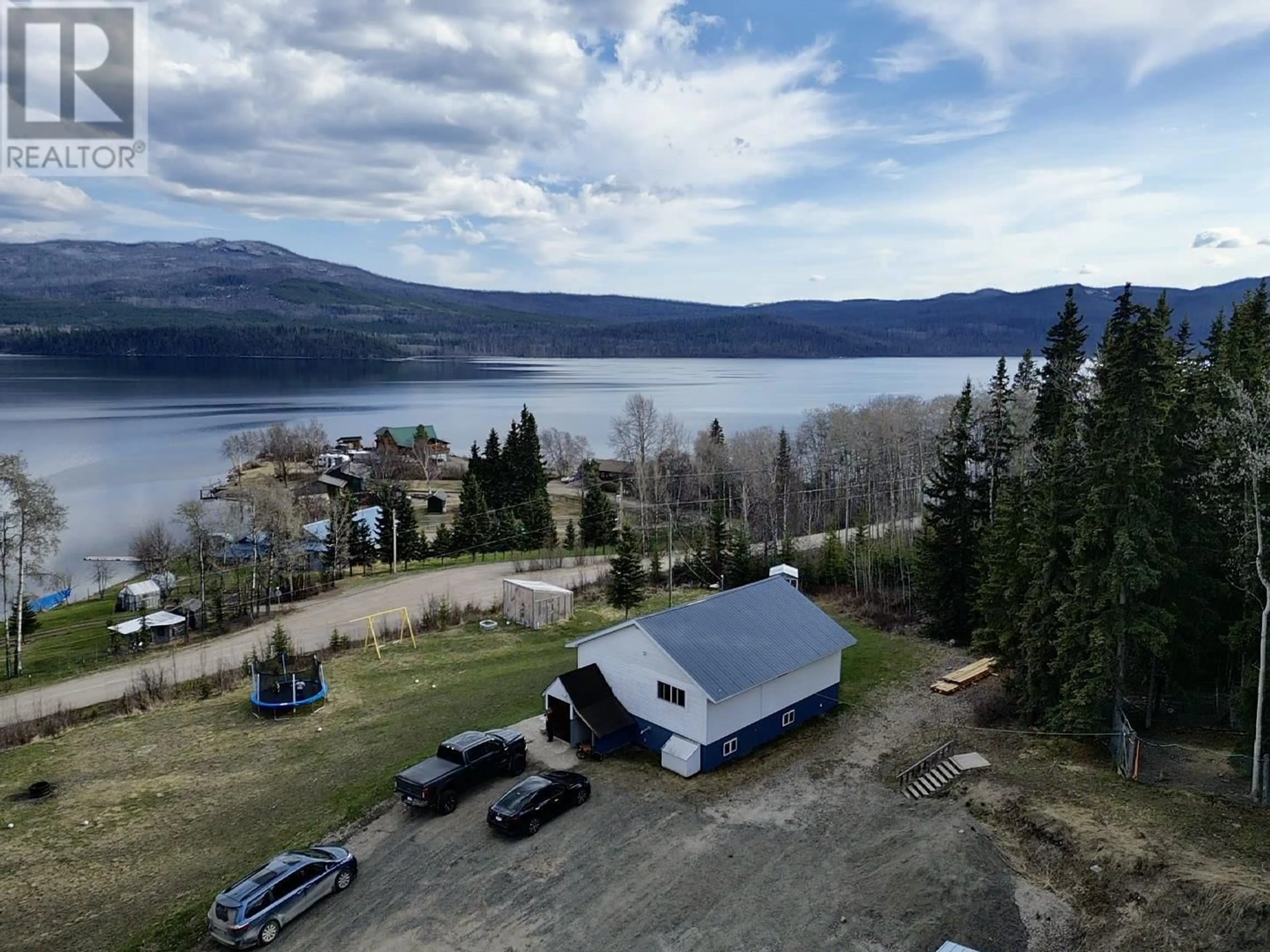 A pic from outside/outdoor area/front of a property/back of a property/a pic from drone, water/lake/river/ocean view for 1408 FRANCOIS LAKE ROAD, Fraser Lake British Columbia V0J1S0