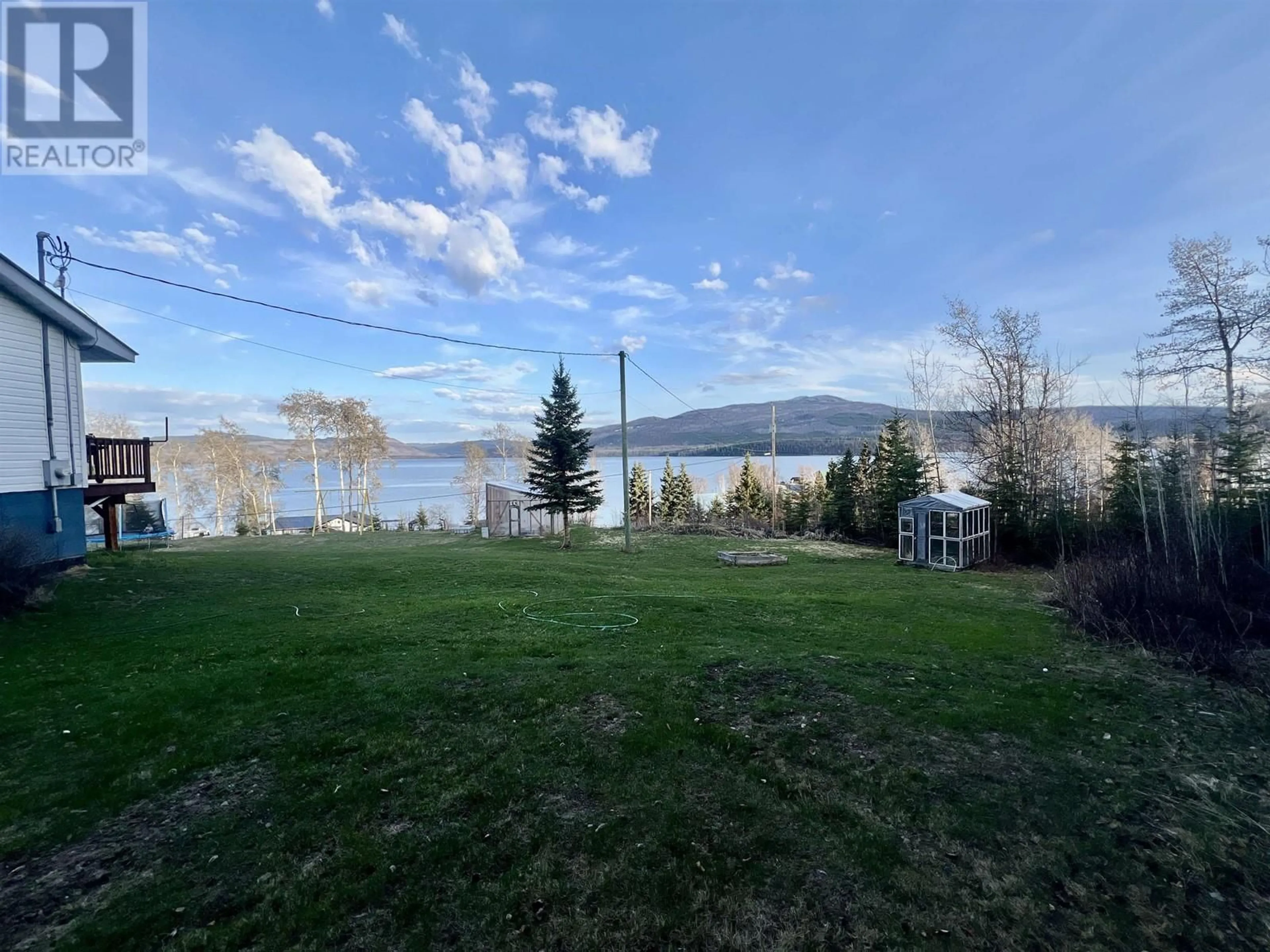 A pic from outside/outdoor area/front of a property/back of a property/a pic from drone, water/lake/river/ocean view for 1408 FRANCOIS LAKE ROAD, Fraser Lake British Columbia V0J1S0