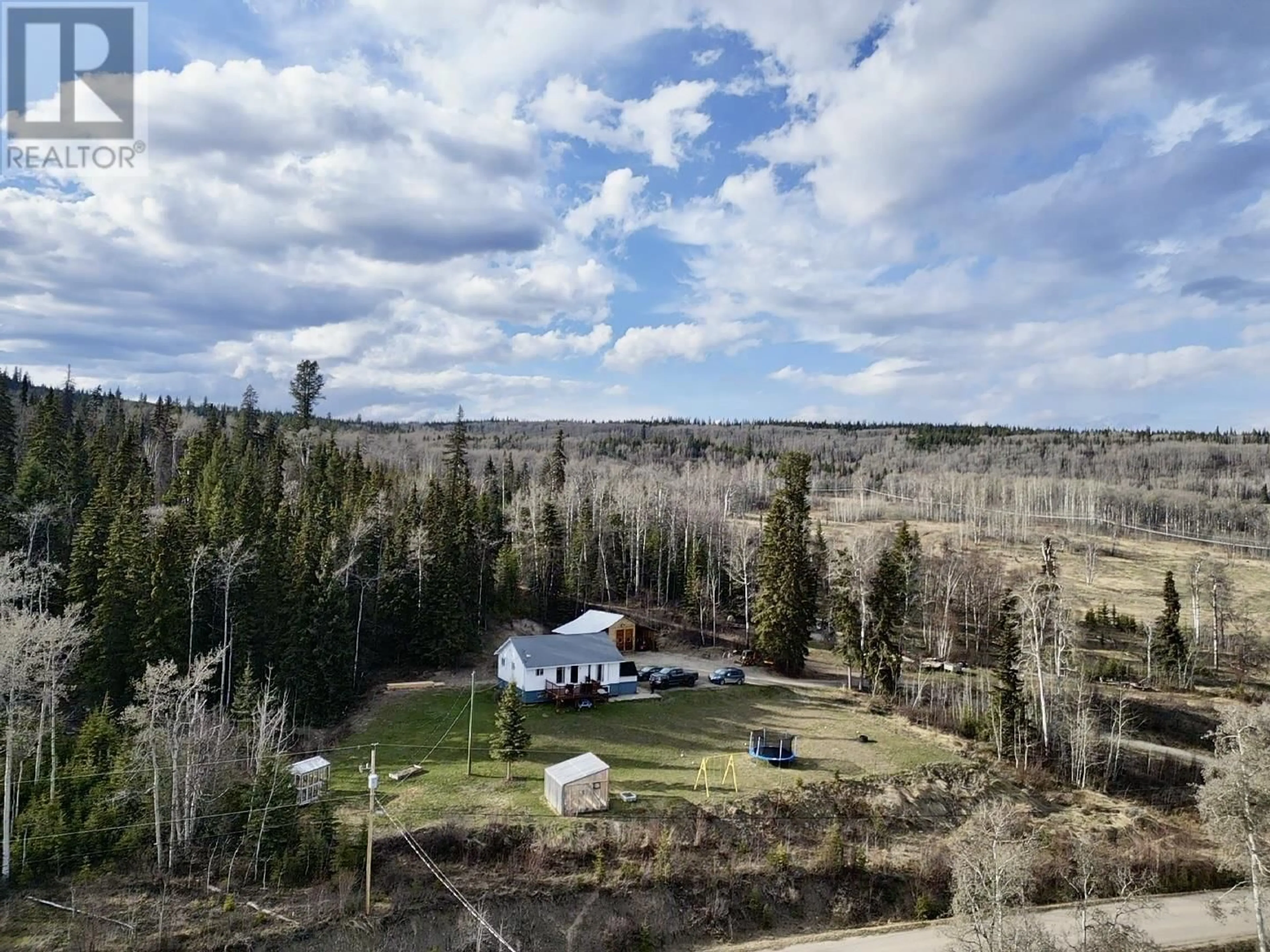 A pic from outside/outdoor area/front of a property/back of a property/a pic from drone, forest/trees view for 1408 FRANCOIS LAKE ROAD, Fraser Lake British Columbia V0J1S0