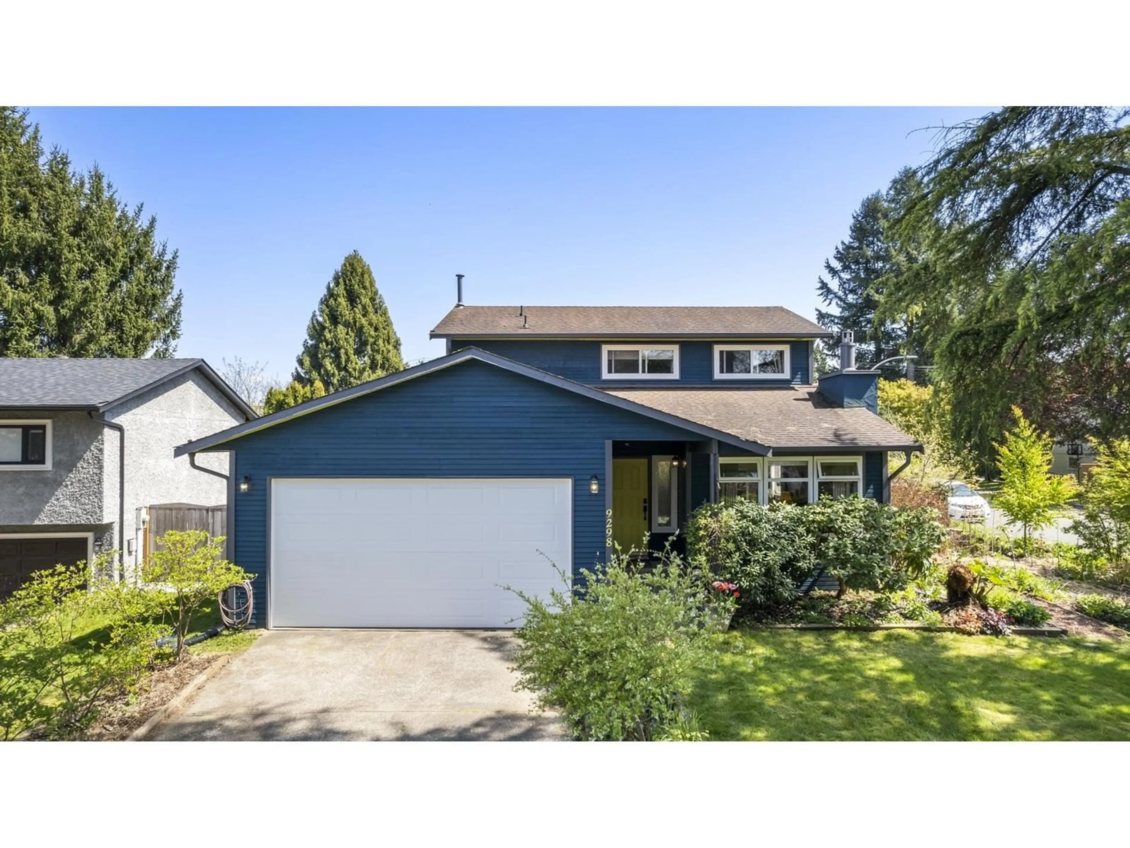 Home with vinyl exterior material, street for 9298 212B, Langley British Columbia V1M1K9