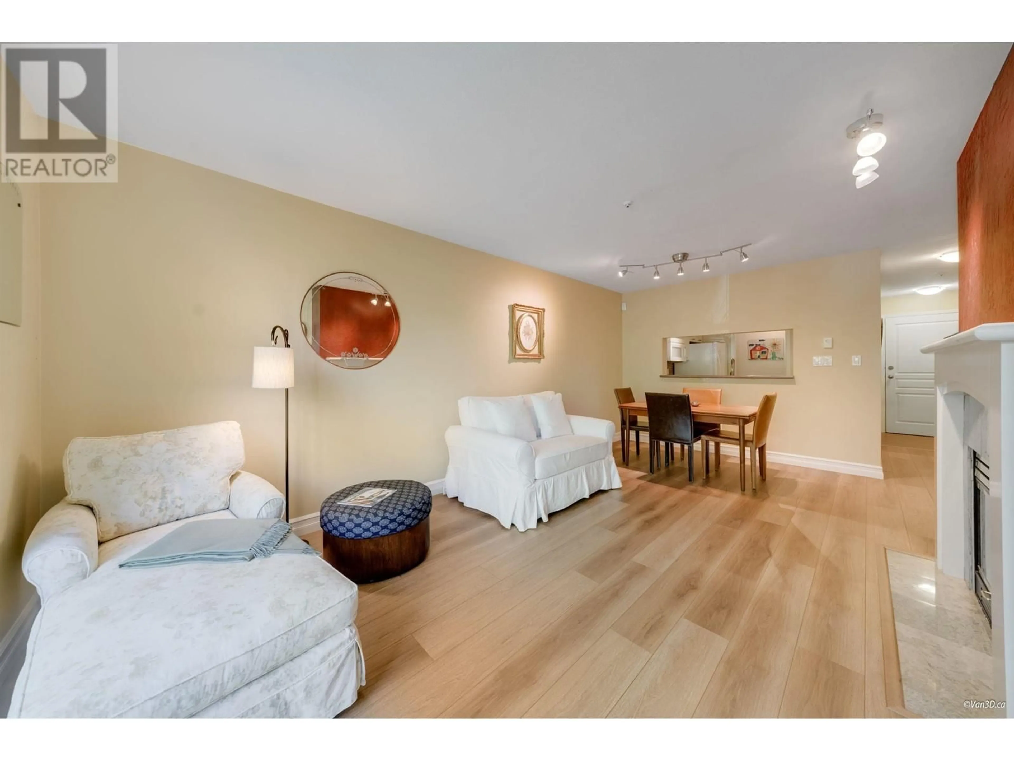 Living room with furniture, unknown for 103 - 8460 JELLICOE STREET, Vancouver British Columbia V5S4S8